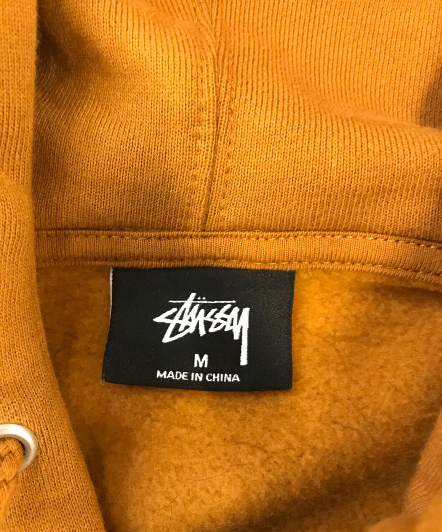 中古・古着通販】stussy (ステューシー) オレンジロゴパーカー