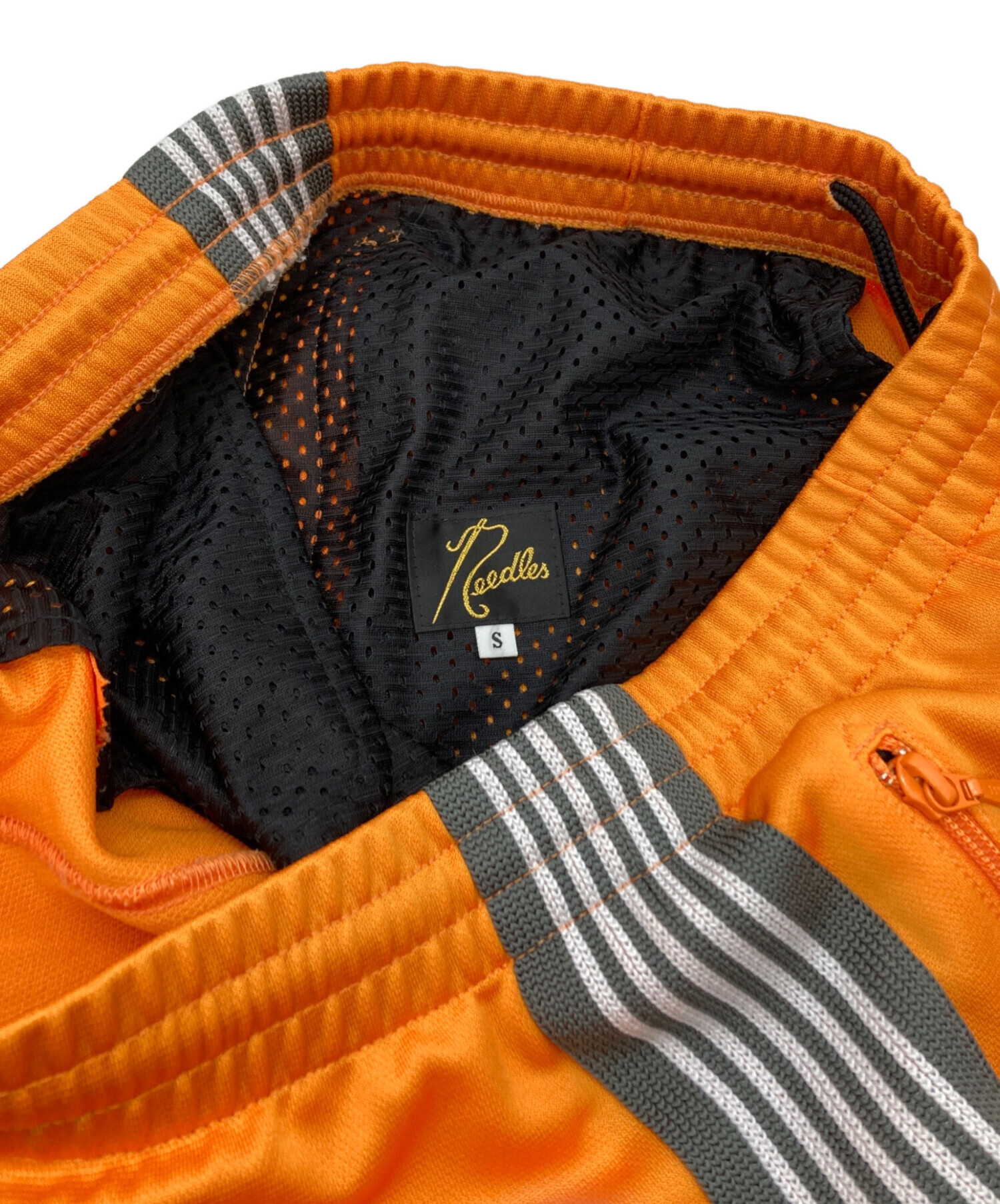 中古・古着通販】Needles (ニードルズ) トラックパンツ オレンジ