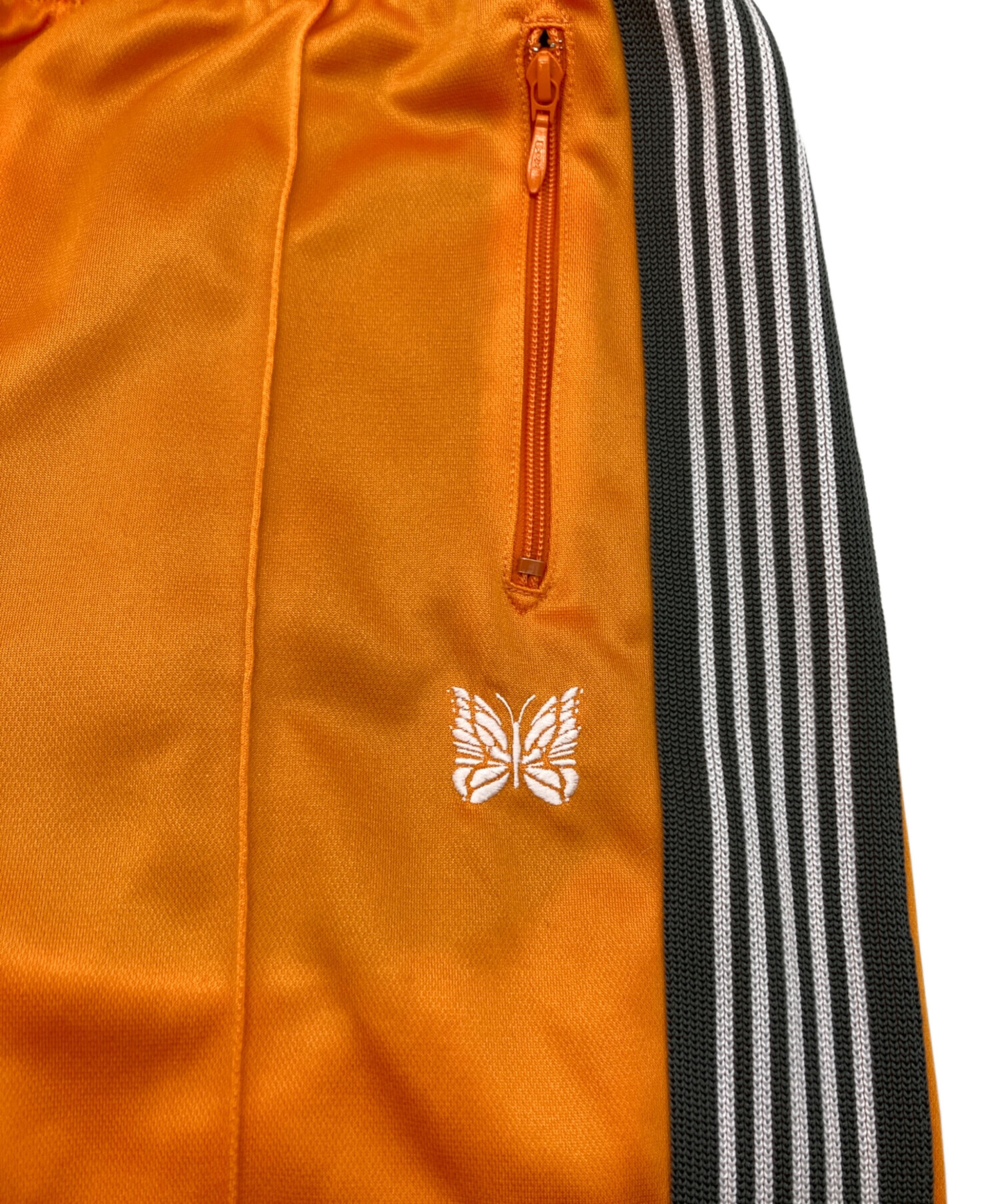 中古・古着通販】Needles (ニードルズ) トラックパンツ オレンジ