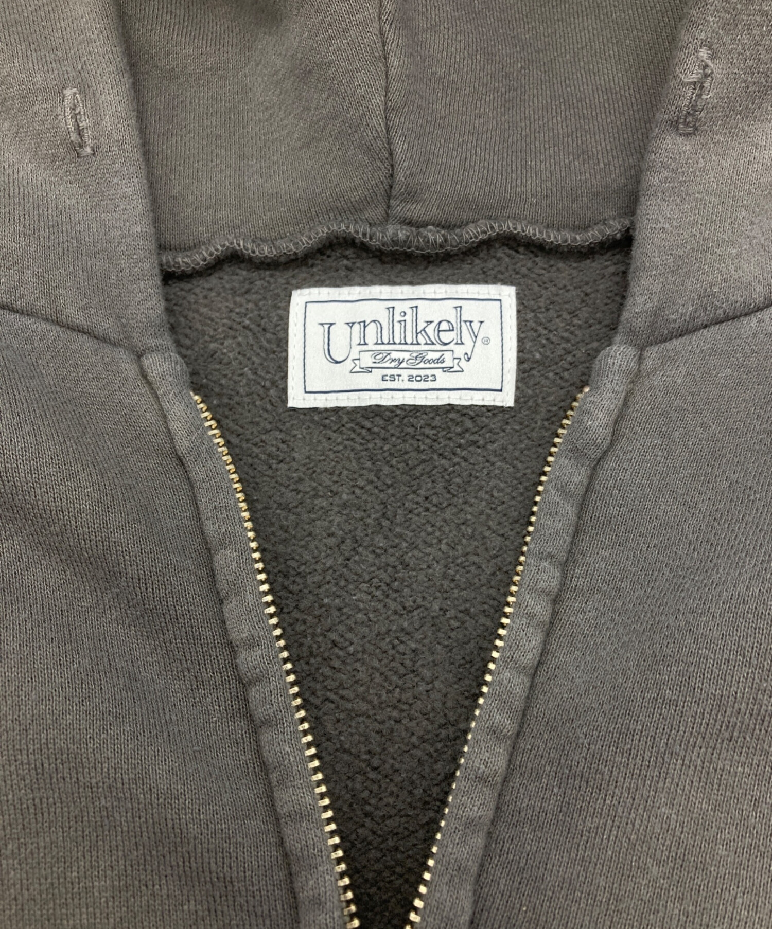 中古・古着通販】Unlikely (アンライクリー) Raglan Zip Hoodie グレー