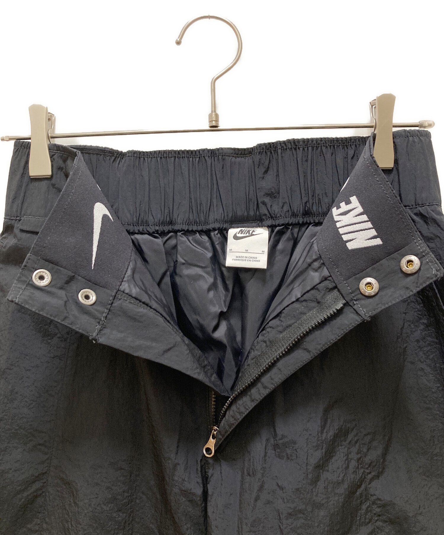 NIKE ランニングパンツ 新古品 中古・古着通販】NIKE (ナイキ) ウーブン カーゴパンツ ブラック