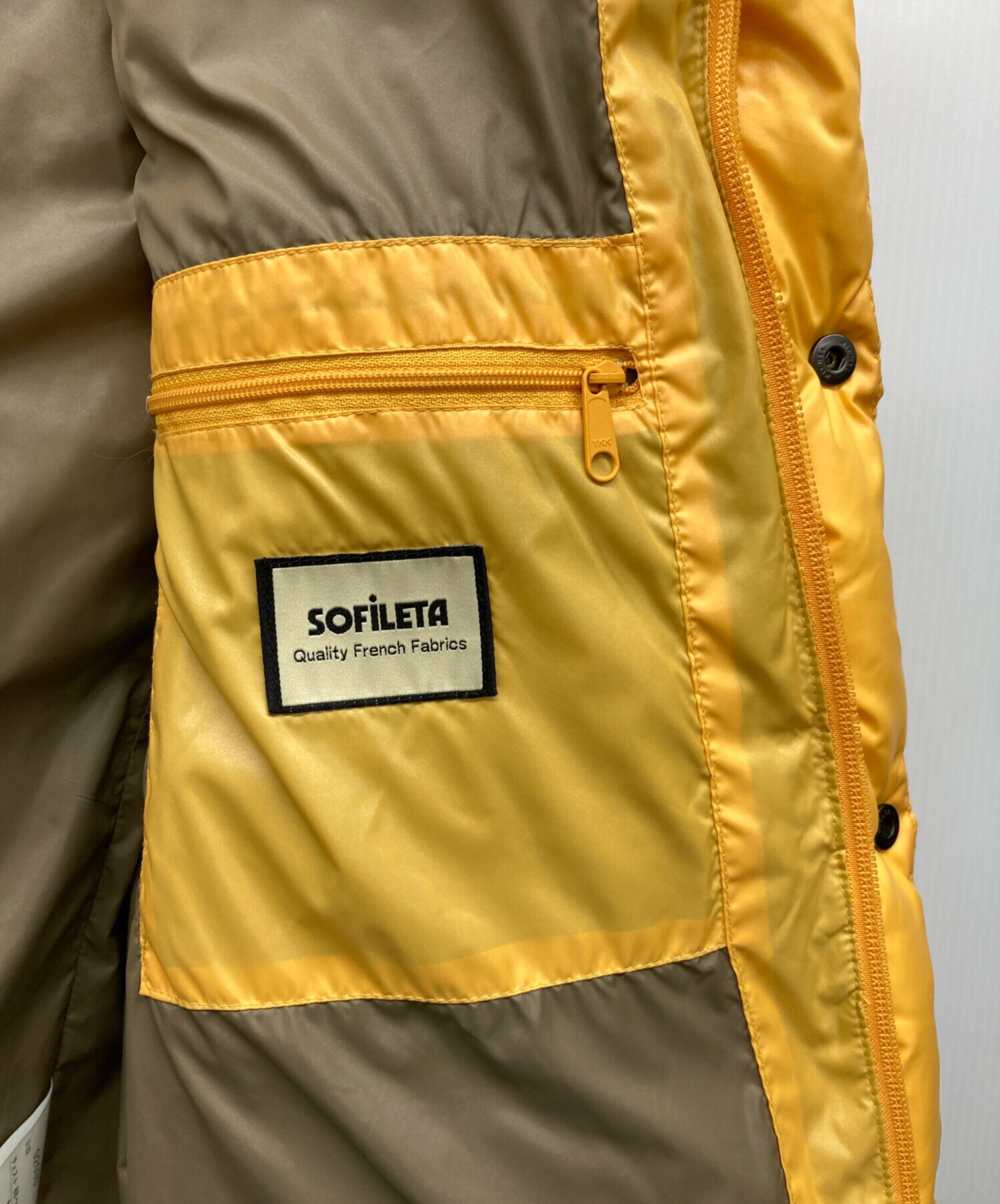 中古・古着通販】CarHartt (カーハート) ダウンジャケット イエロー 