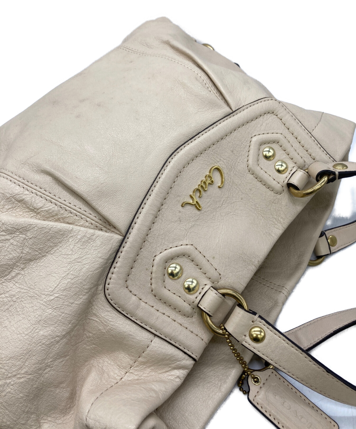 【未使用】COACH コーチ ハンドバッグ メタリックベージュ シミあり格安 中古・古着通販】COACH (コーチ) ハンドバッグ ベージュ｜ブランド