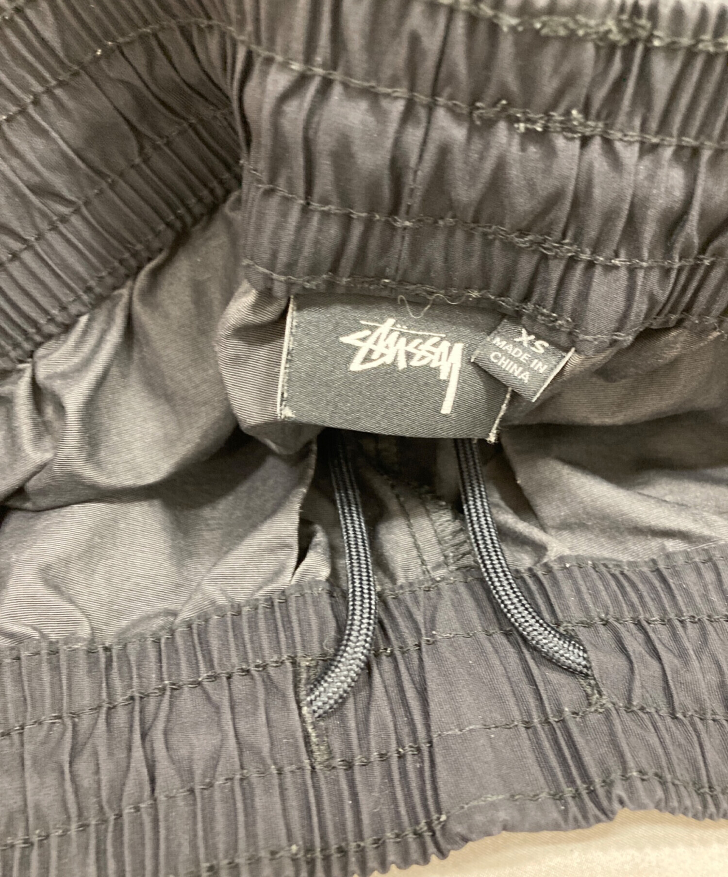 中古・古着通販】stussy (ステューシー) ナイロンパンツ ブラック