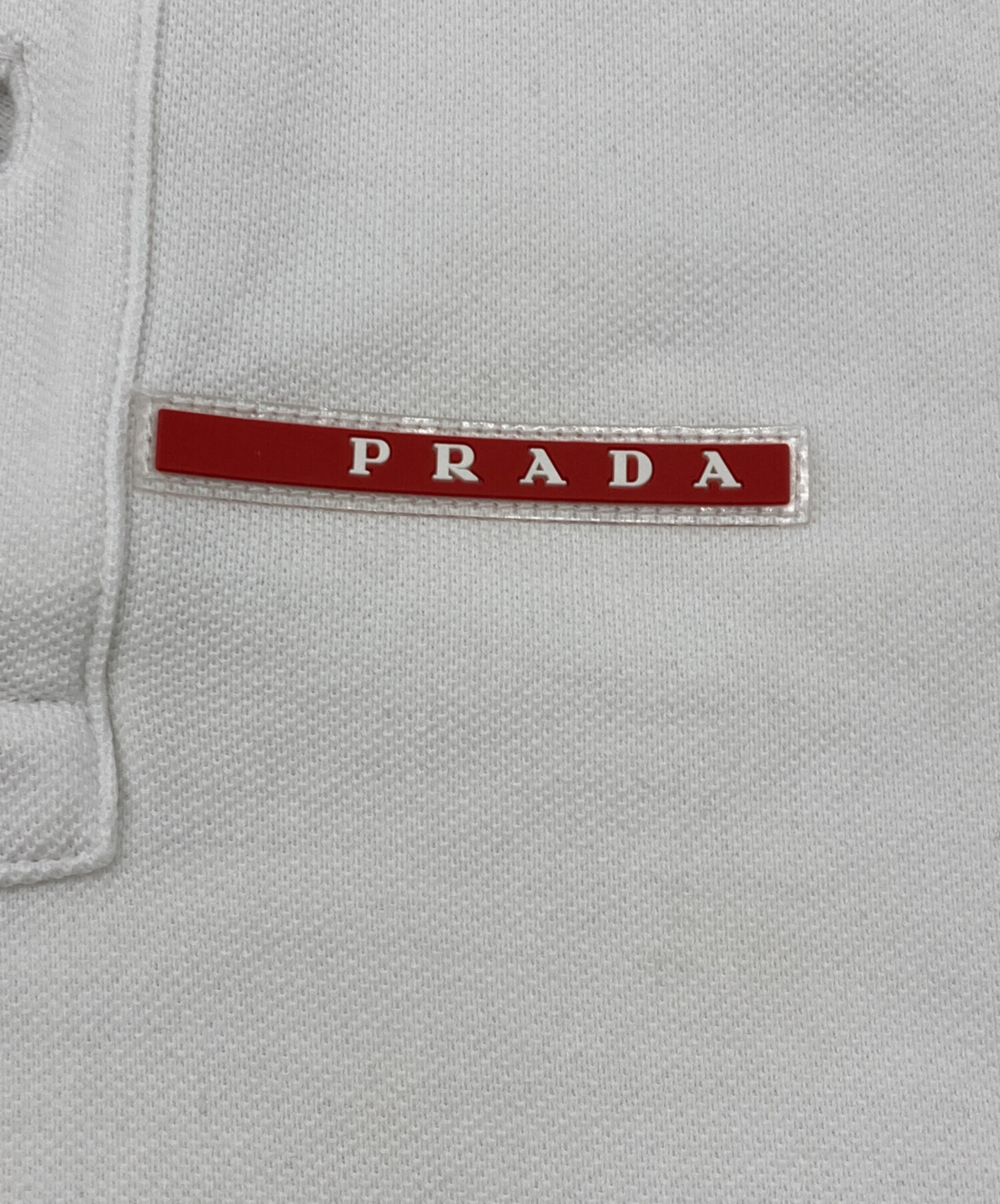 PRADA プラダ　ポロシャツホワイト ホワイト（白）系 L PRADA(プラダ) ポロシャツ(メンズ) - ブランド通販