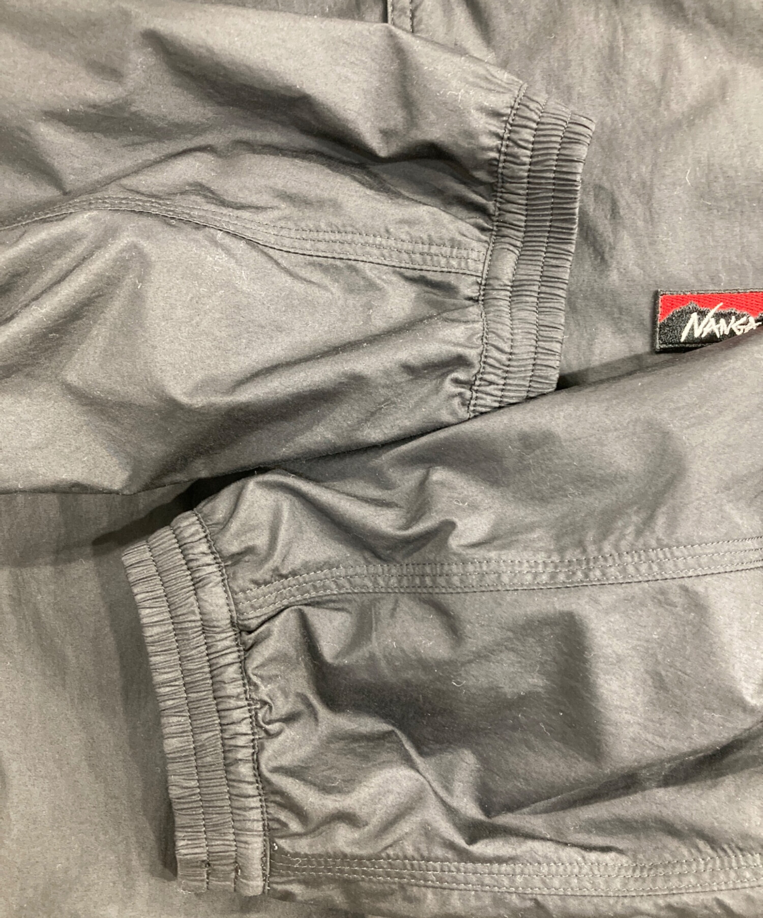 中古・古着通販】NANGA (ナンガ) リブカラーコーチジャケット ブラック