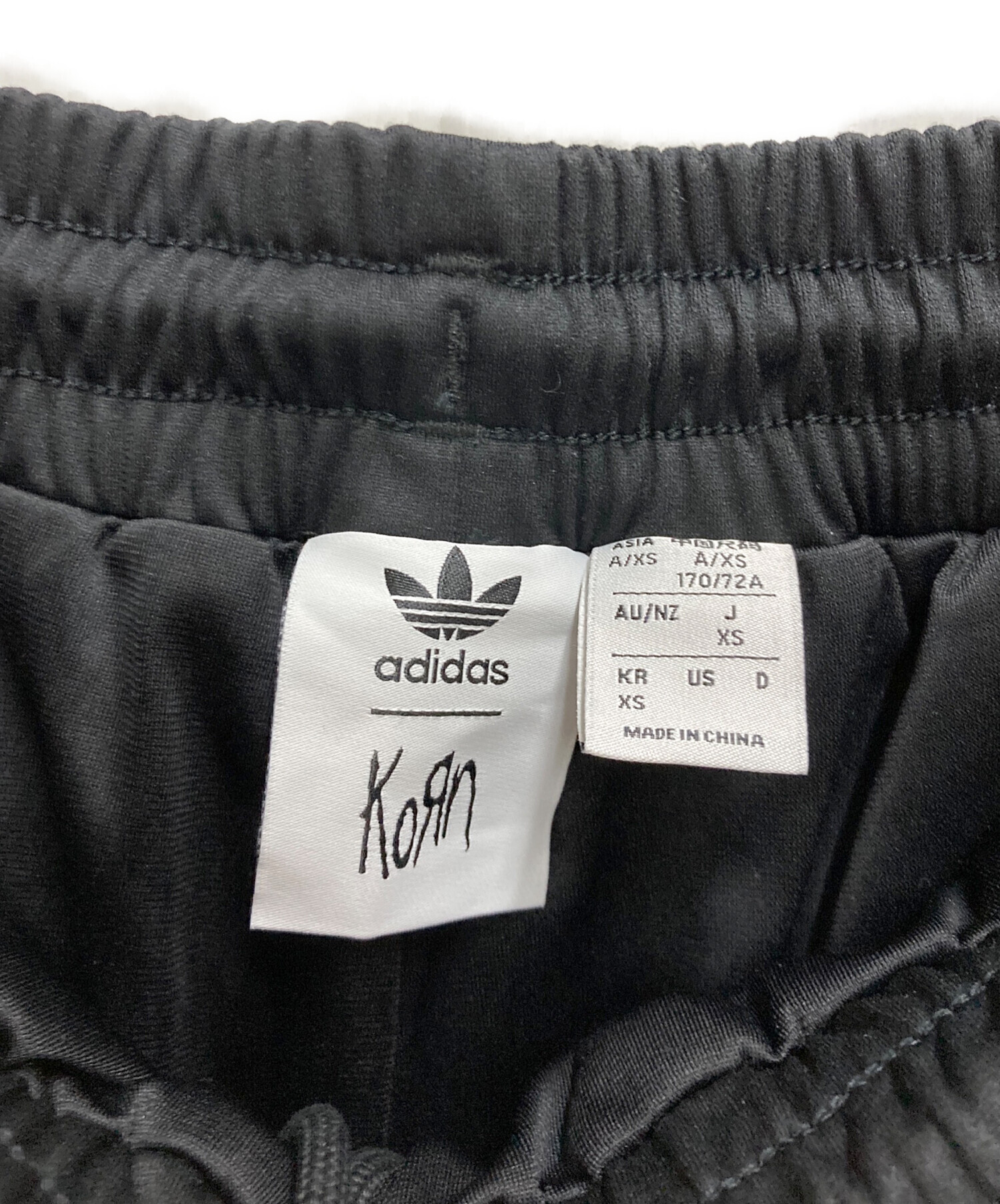 中古・古着通販】adidas (アディダス) Korn (コーン) トラックパンツ