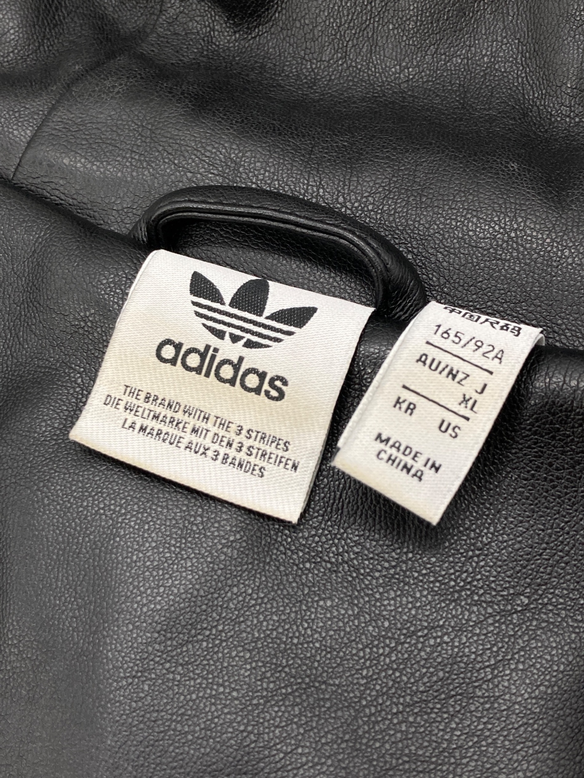 adidas　オーバーサイズブレザージャケット レディース Adilenium オーバーサイズ フェイクレザージャケット