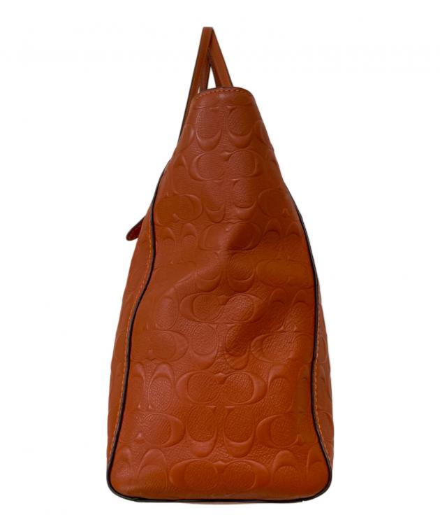 COACH オレンジ レザートートバッグ 中古・古着通販】COACH (コーチ) Large Signature Embossed Leather