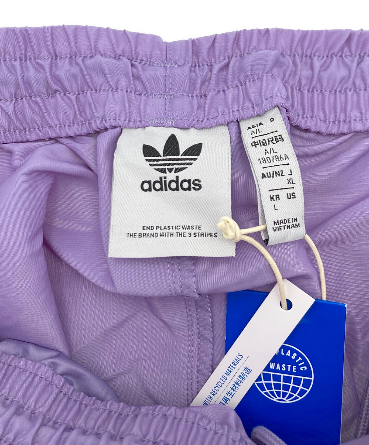  アディダス ナイロン セットアップ 紫 レアカラー 中古・古着通販】adidas (アディダス) ナイロンパンツ パープル サイズ