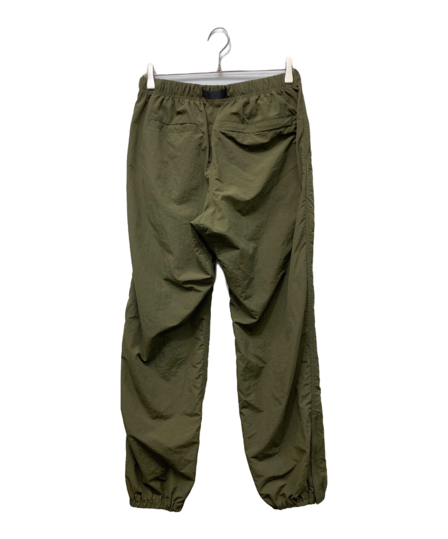 《新品未使用タグ付Gramicci /グラミチトラックパンツ オリーブグリーン 中古・古着通販】GRAMICCI (グラミチ) NYLON TRACK PANT オリーブ