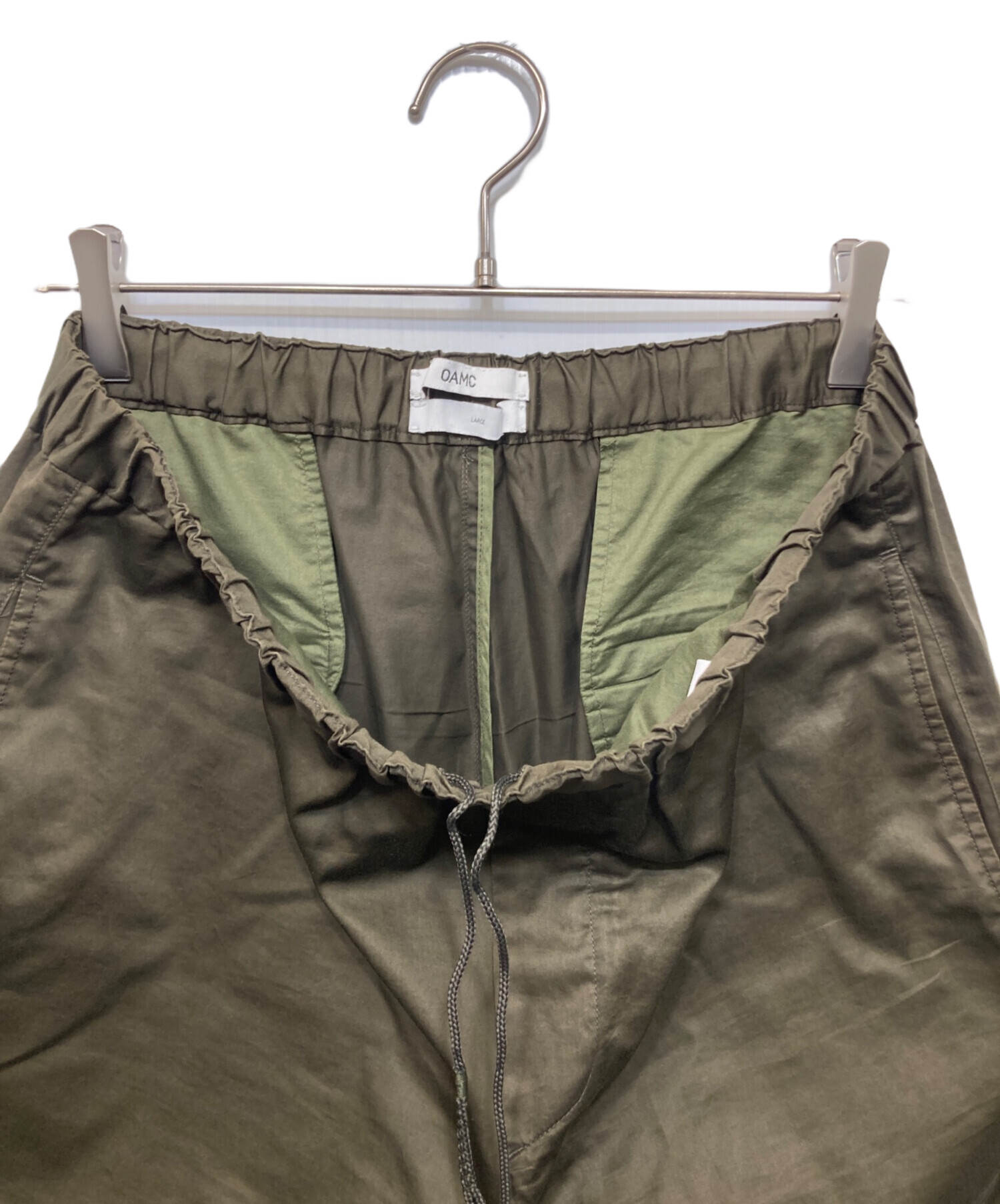 OAMC スラックス オリーブ カーキ 中古・古着通販】OAMC (オーエーエムシー) Cropped Drawcord Trousers