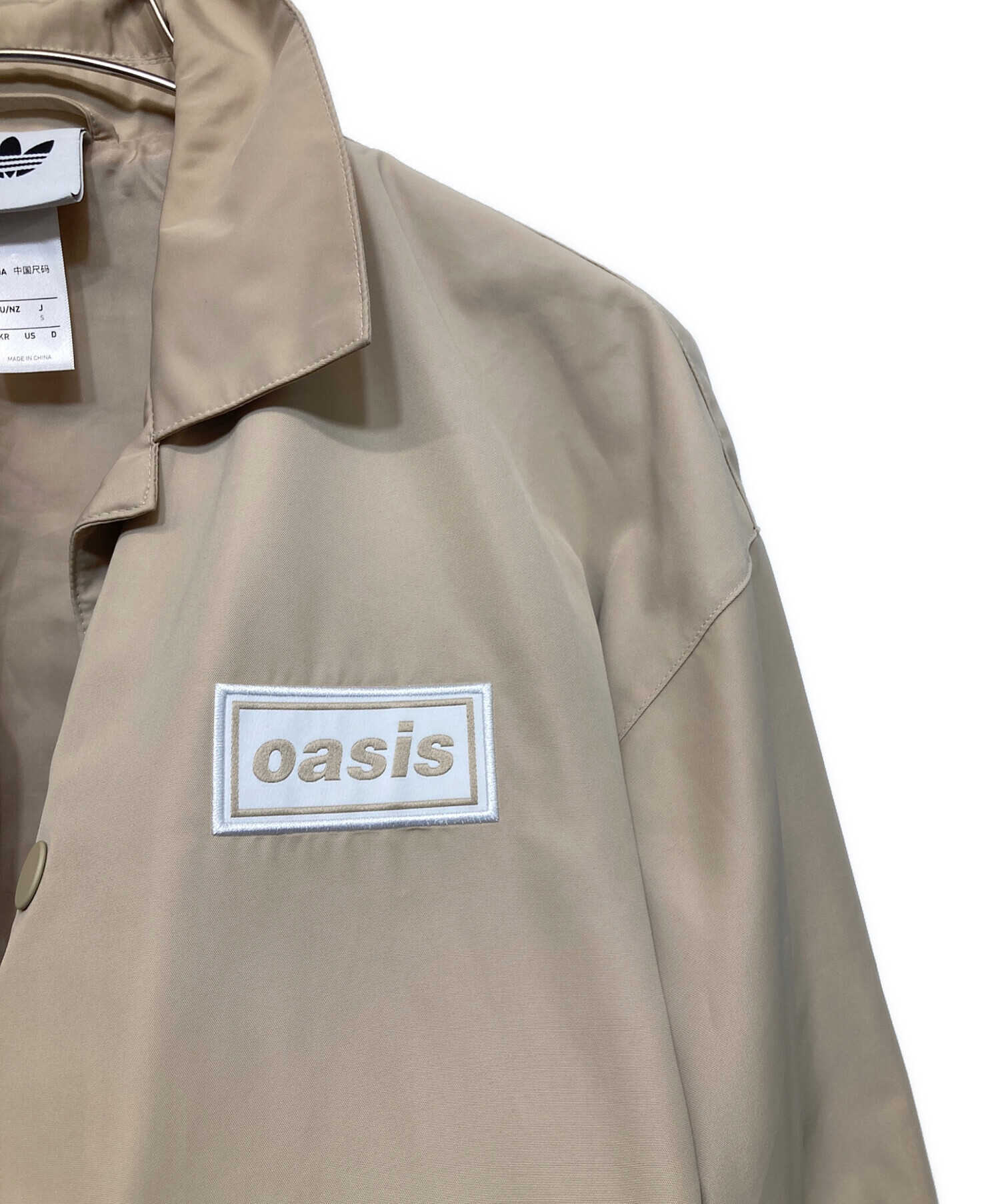 中古・古着通販】adidas (アディダス) oasis (オアシス) ツアーコーチ