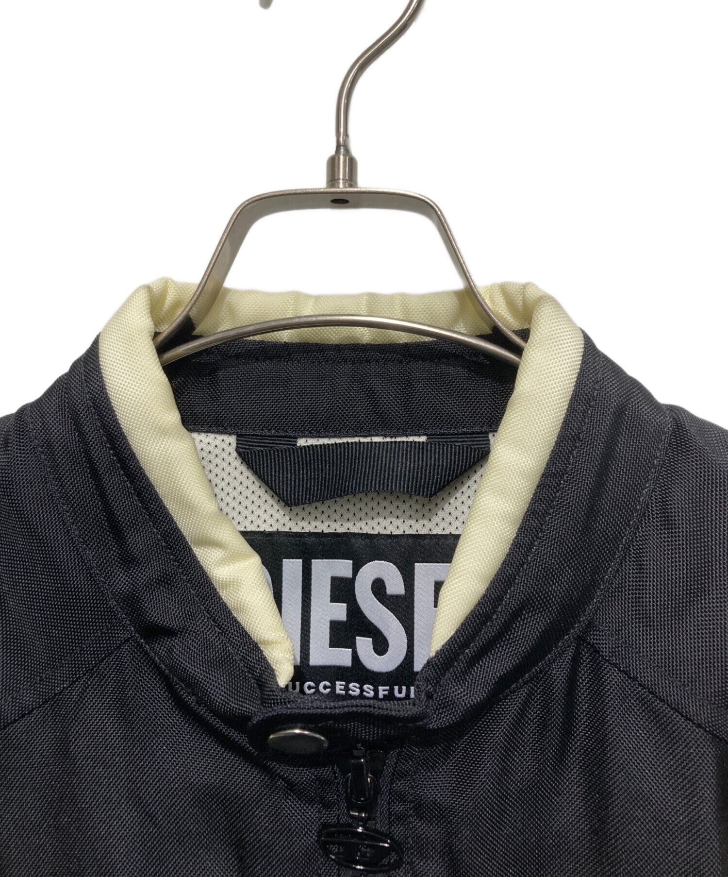8437. 【未使用タグ付き】DIESEL 総柄トラックジャケット 中古・古着通販】DIESEL (ディーゼル) J-BLINK-A JACKET ブラック