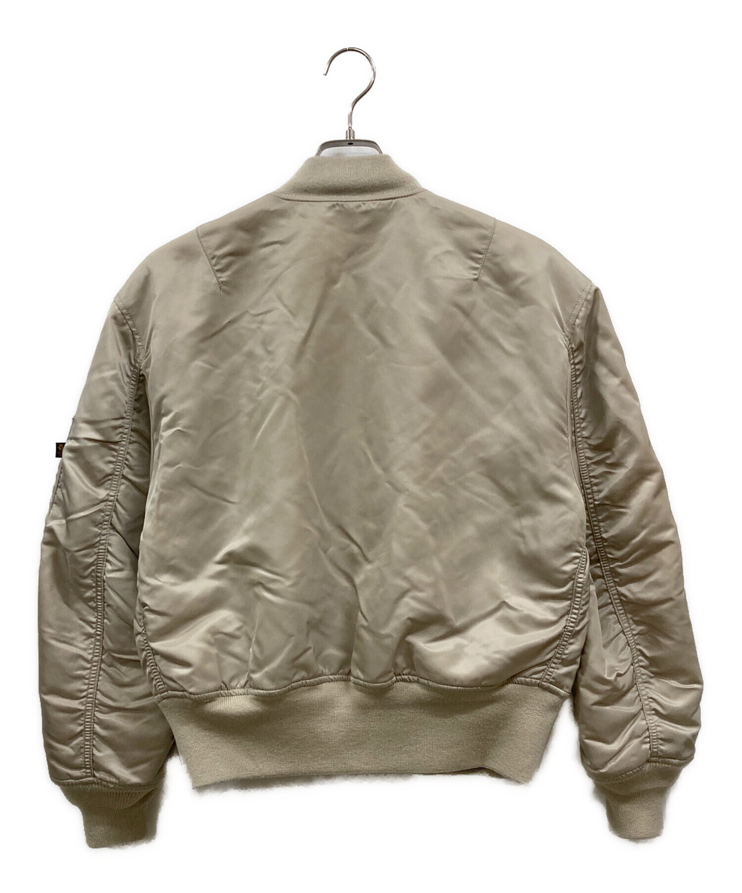 Alpha Industries（アルファインダストリーズ）の「ALPHA × AMERICAN RAG CIE 別注ナイロンMA-1（ ミリタリージャケット）」 - WEAR ALPHA INDUSTRIES ミリタリージャケット ベージュ MEDIUM