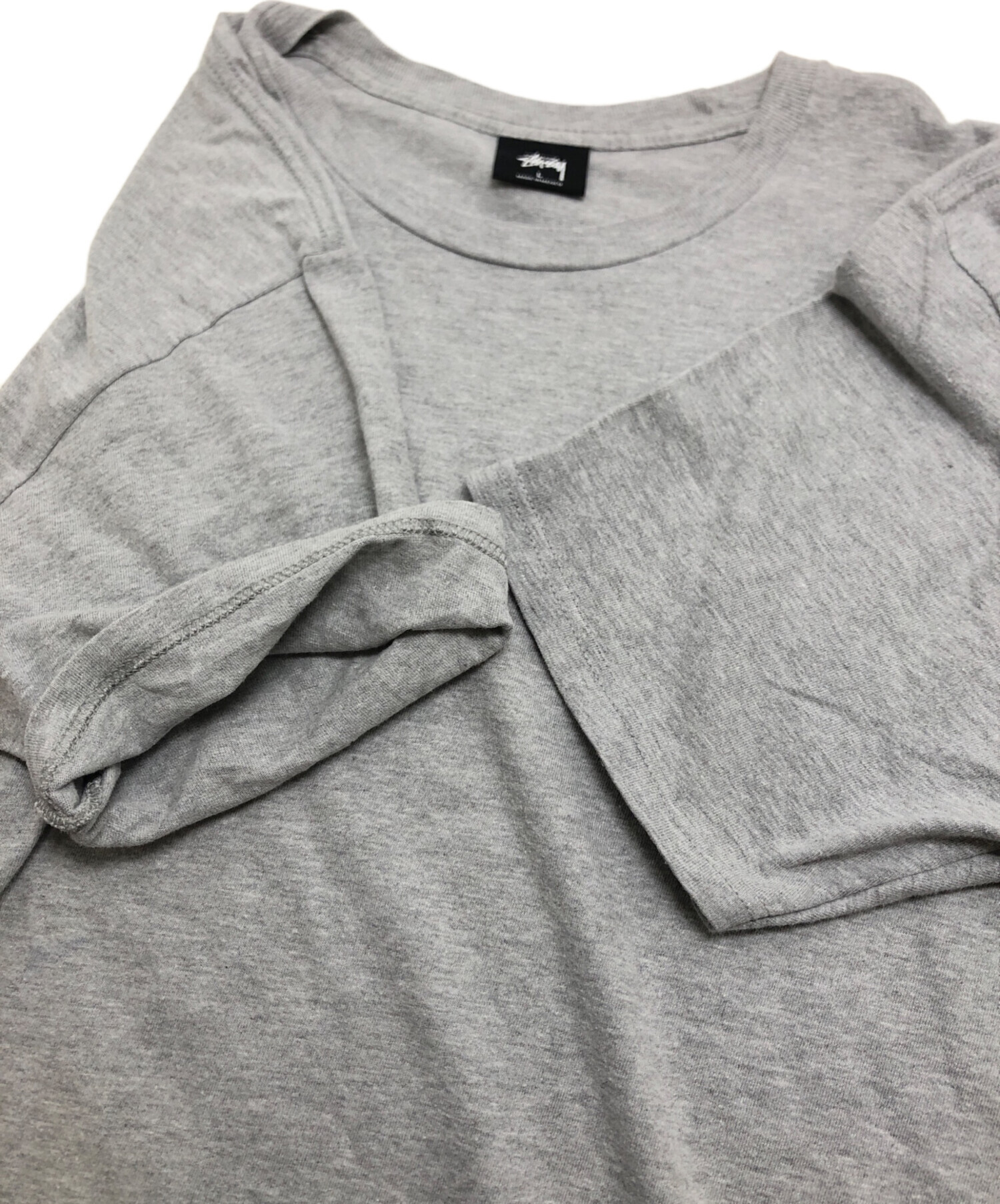 新品　スチューシー　STUSSY Tシャツ L グレー 中古・古着通販】stussy (ステューシー) Tシャツ グレー サイズ:L