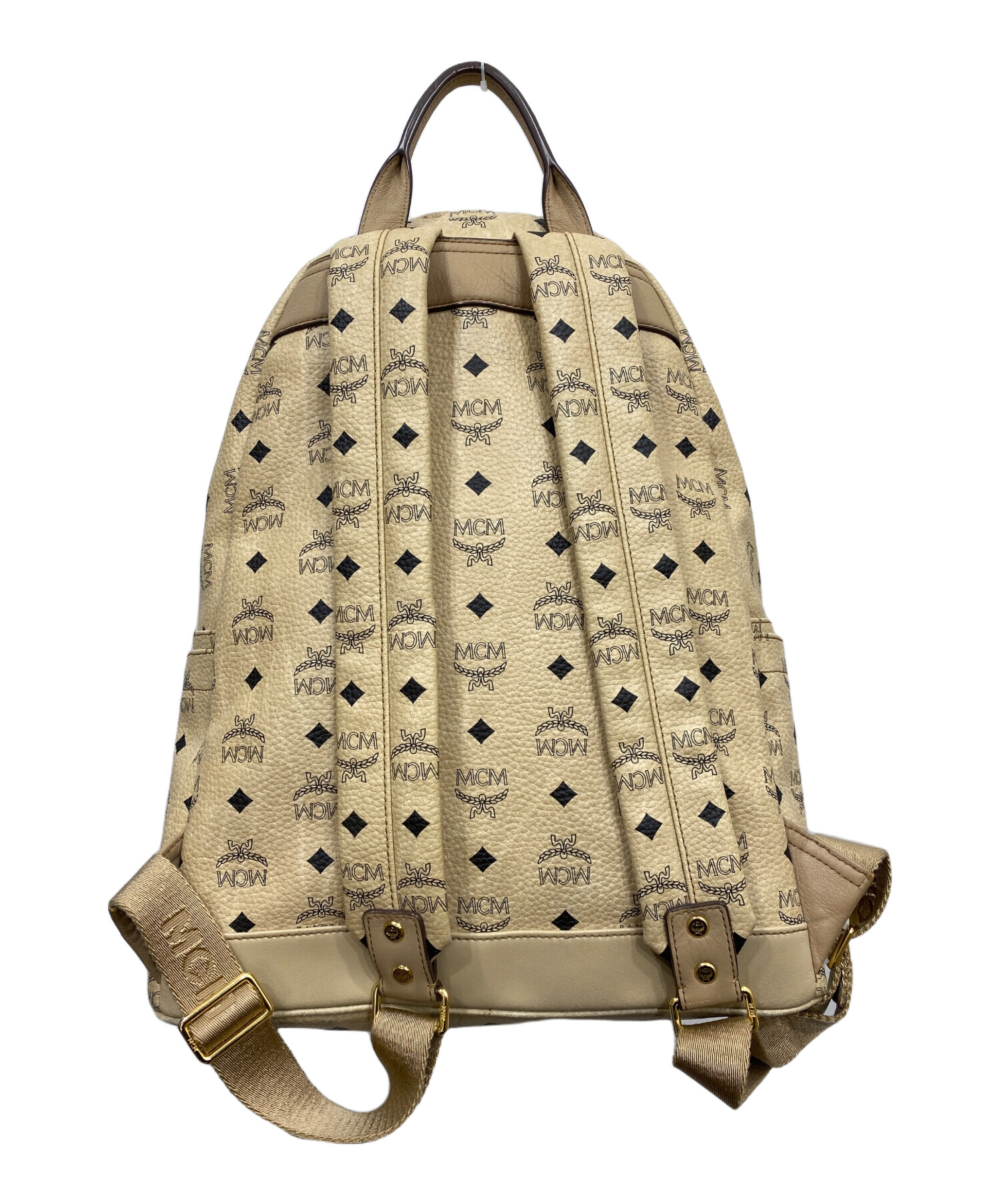 MCM ロゴプリント ベージュ リュック 中古・古着通販】MCM (エムシーエム) ヴィセトスロゴグラムスタッズ