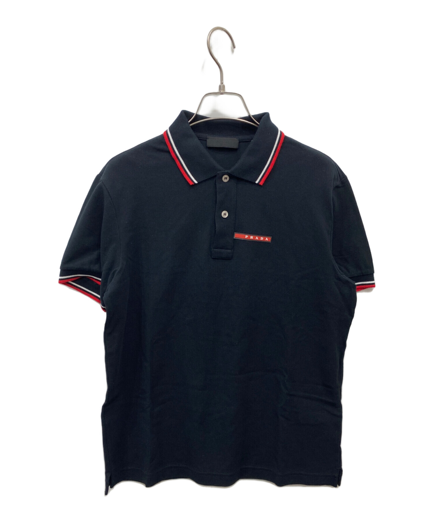 PRADA SPORT 赤タグ ポロシャツ 黒 archive 中古・古着通販】PRADA (プラダ) ラバーロゴポロシャツ ブラック