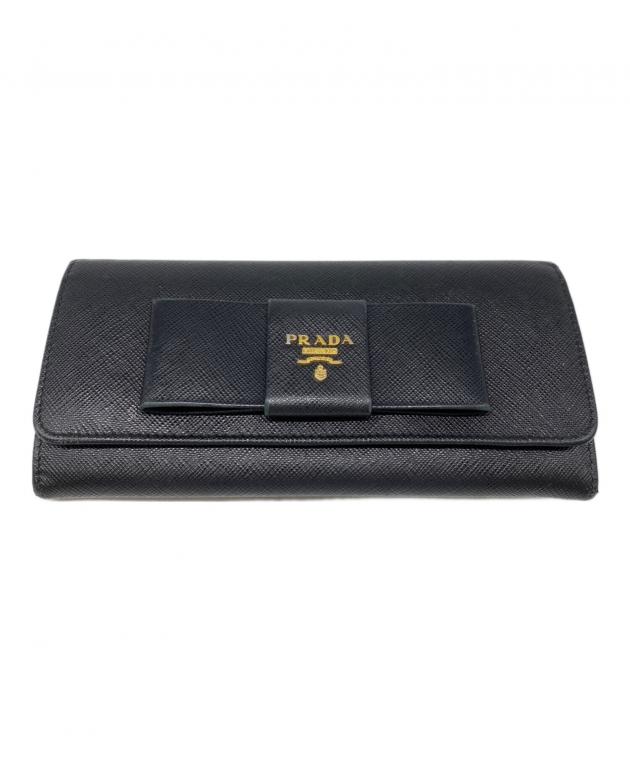 PRADA 長財布 リボン サフィアーノ フィオッコ メタルロゴ フラップ 黒 中古・古着通販】PRADA (プラダ) サフィアーノ フィオッコ リボン長