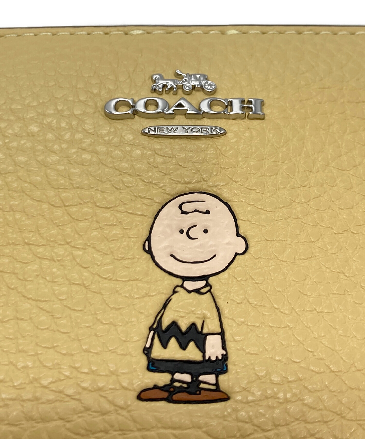 COACH コーチ PEANUTS ピーナッツ チャーリーブラウン イエロー 中古・古着通販】COACH (コーチ) PEANUTS (ピーナッツ) スナップ