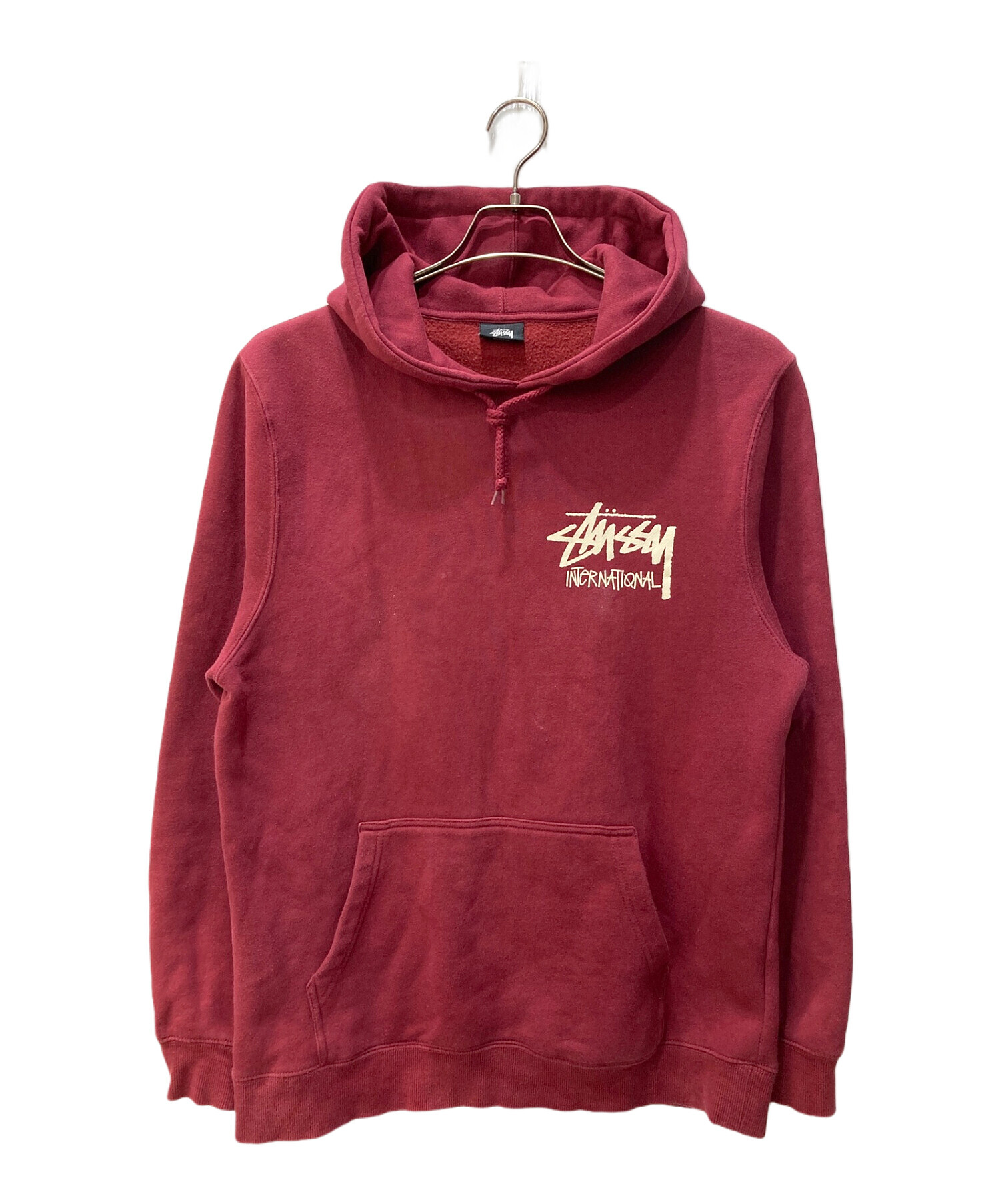 Stussy 赤 パーカー Mサイズ 中古・古着通販】stussy (ステューシー) パーカー レッド サイズ:Ⅿ