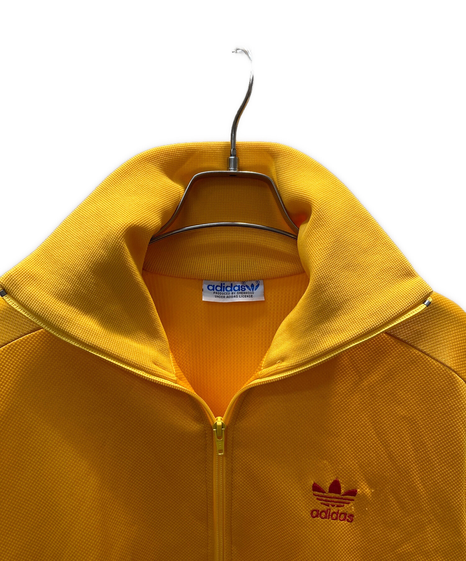 中古・古着通販】adidas (アディダス) トラックジャケット オレンジ 