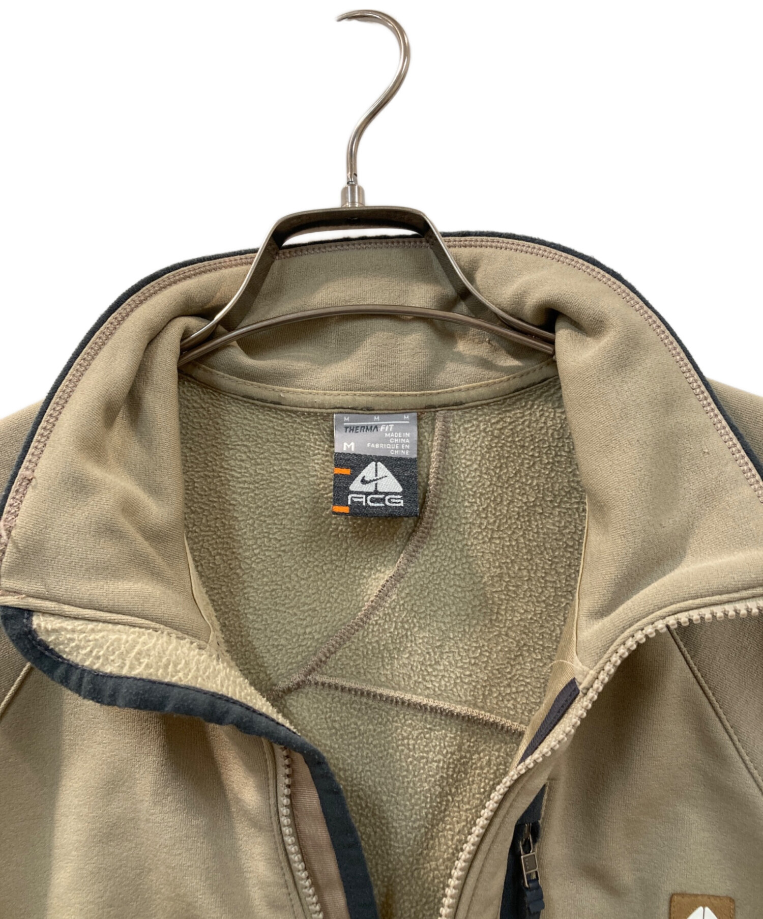 NIKEACGナイキエーシージーナイロントラックジャケットベージュアウトドアロゴ 中古・古着通販】NIKE ACG (ナイキエーシージー) トラックジャケット