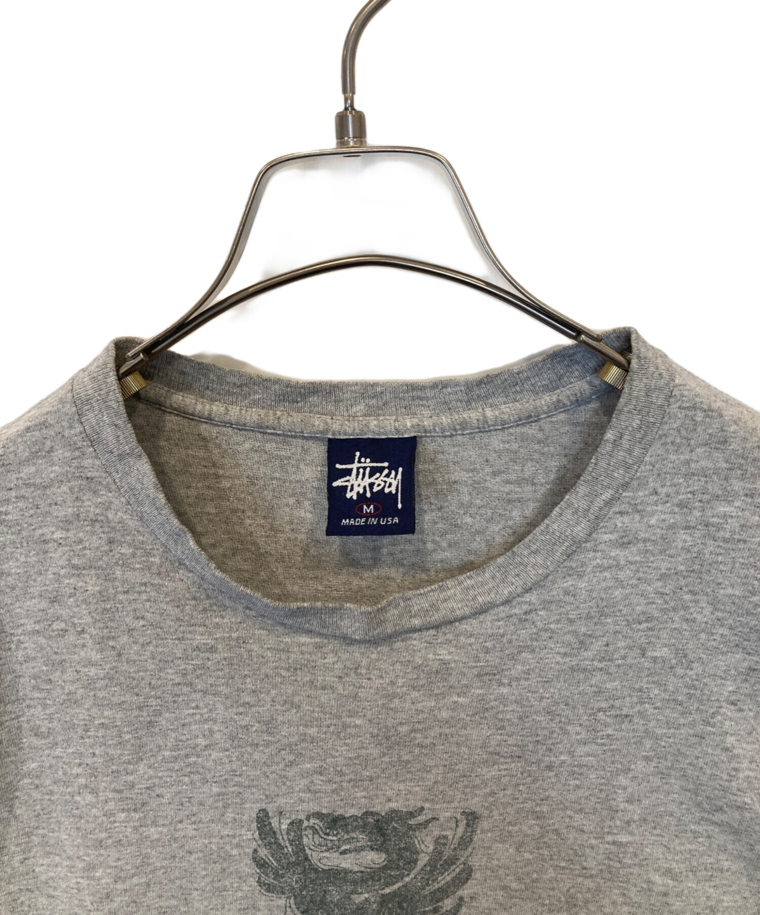 中古・古着通販】stussy (ステューシー) 紺タグ プリントTシャツ 