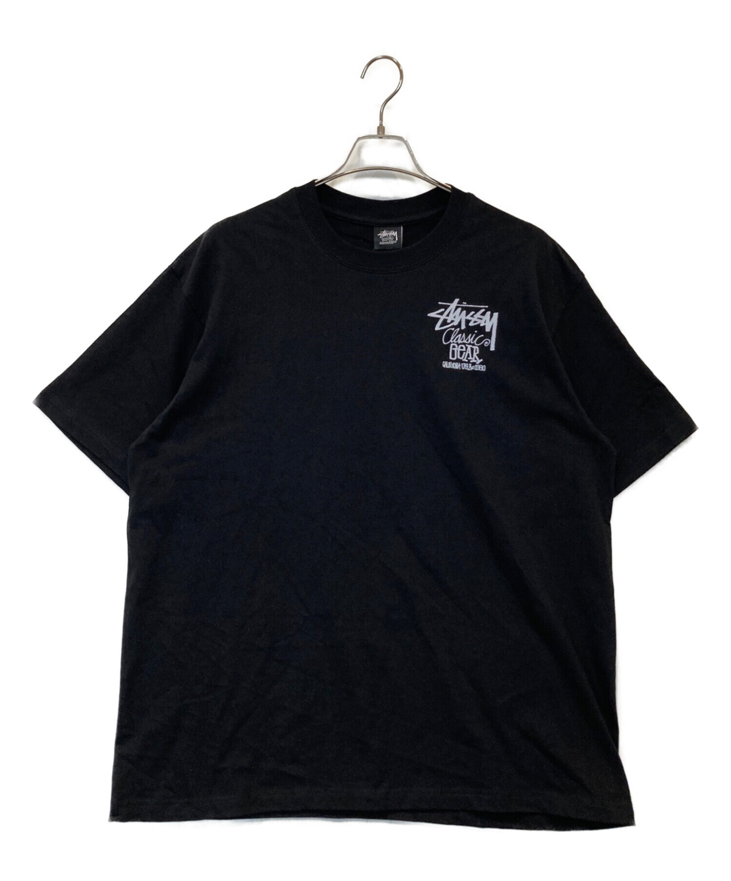 ☆古着　STUSSY　ステューシー　黒　Tシャツ　サイズ：Ｌ　中古品 中古・古着通販】stussy (ステューシー) Classic Gear Tシャツ