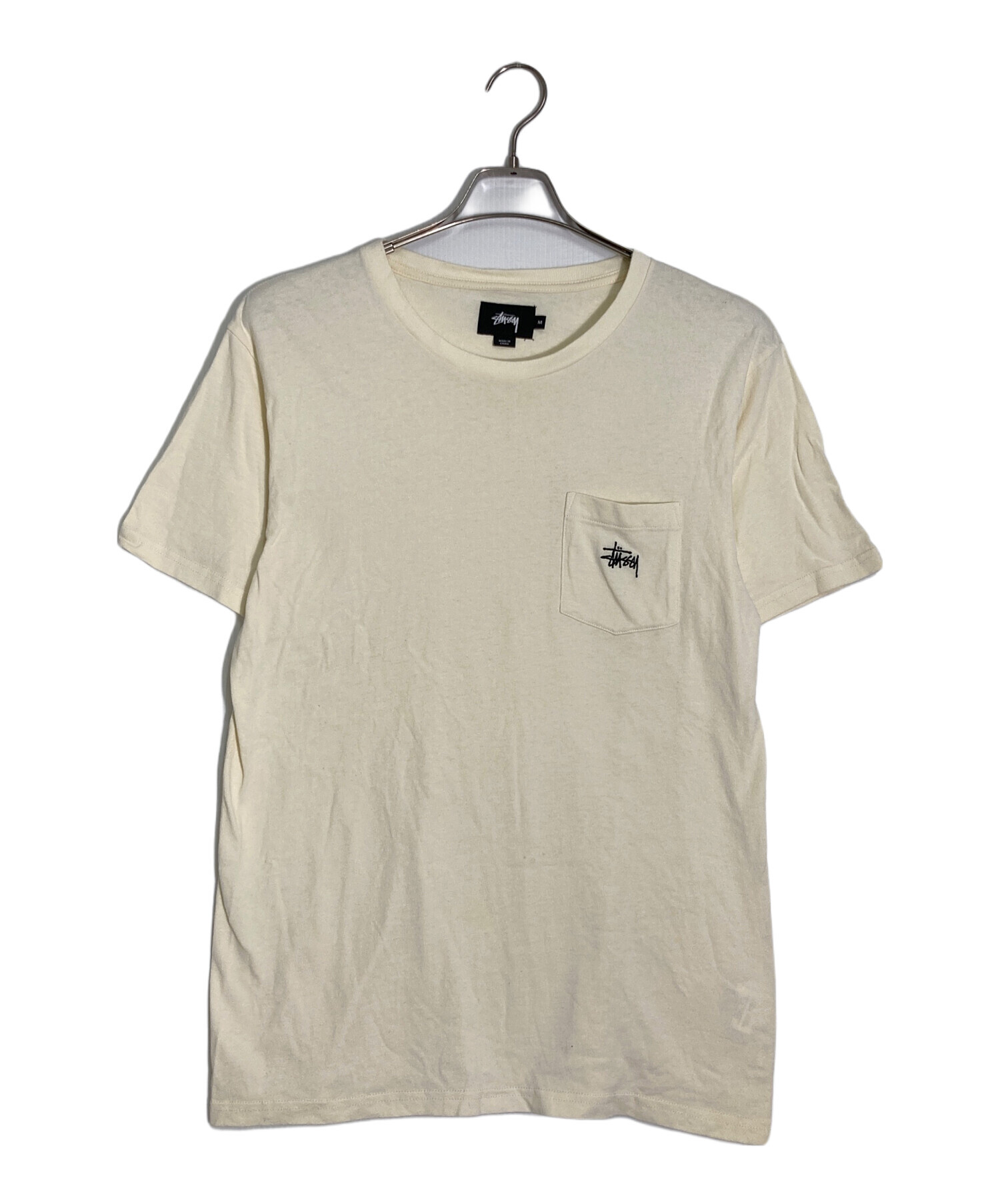 STUSSY ステューシー ライダース M ベージュ 【古着】【中古】【送料無料】 中古・古着通販】stussy (ステューシー) ポケットTシャツ ベージュ