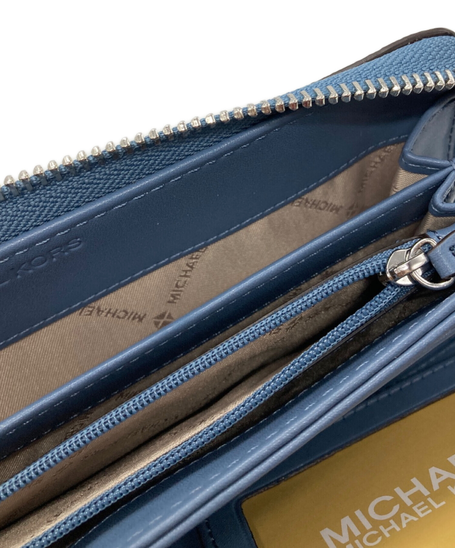 【タグ付き未使用品】MICHAEL KORS 長財布 カモフラ ブルー ブラック 中古・古着通販】MICHAEL KORS (マイケル・コース) 長財布 ブルー