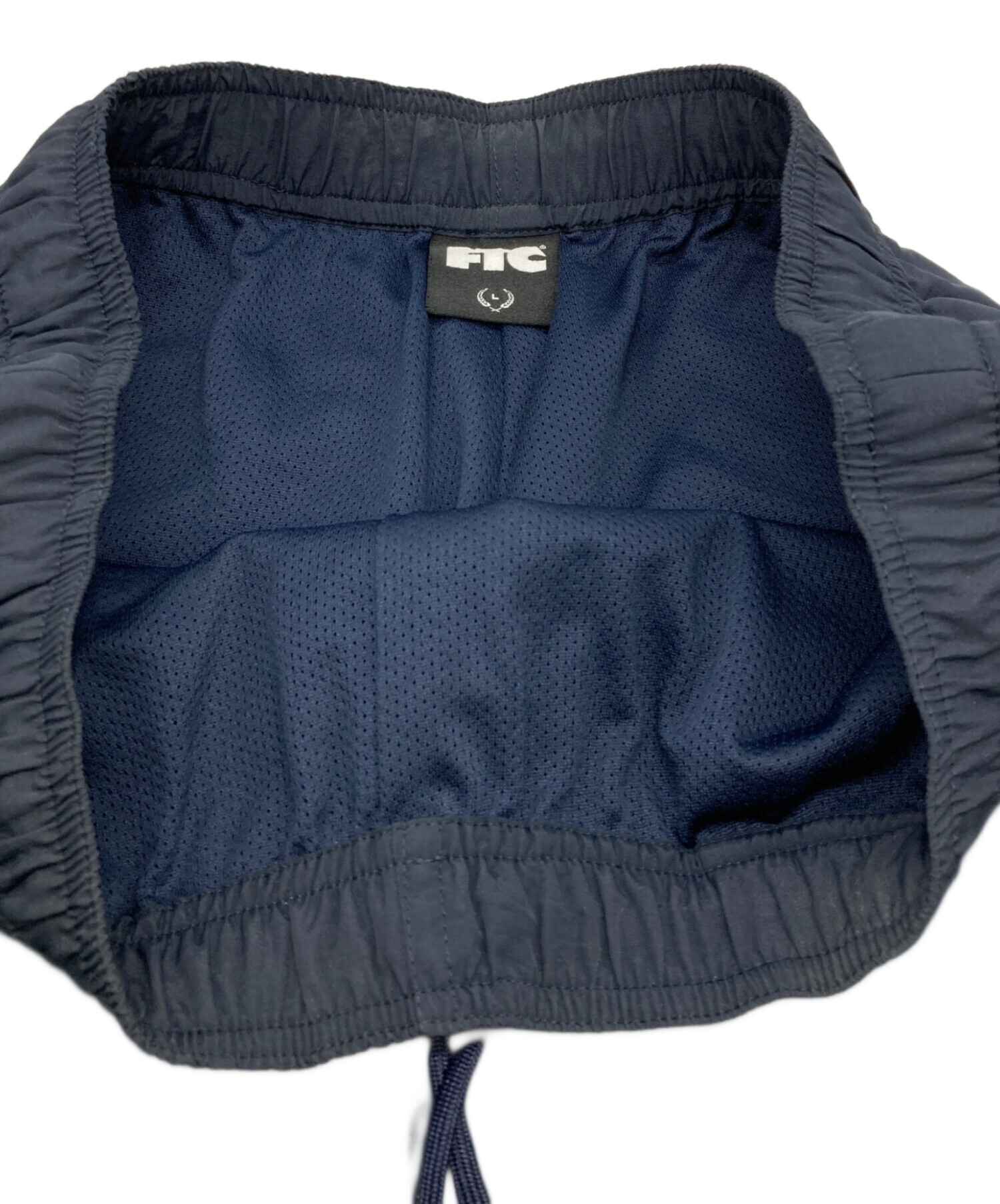 中古・古着通販】FTC (エフティーシー) ナイロンパンツ ネイビー