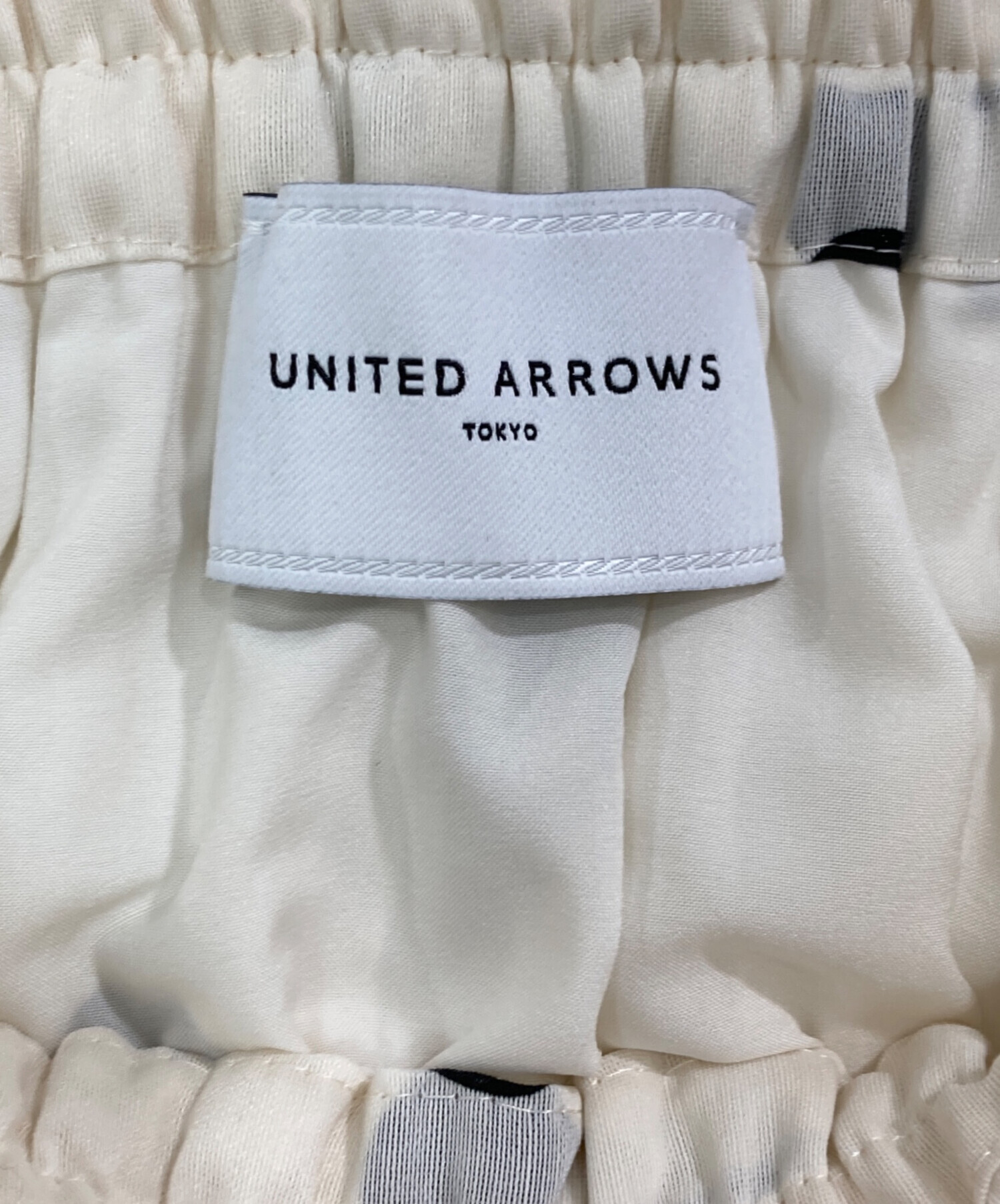 【新品タグ付き】UNITED ARROWSオーガンジープリントプリーツスカート UNITED ARROWS（ユナイテッドアローズ）の「オーガンジー プリント