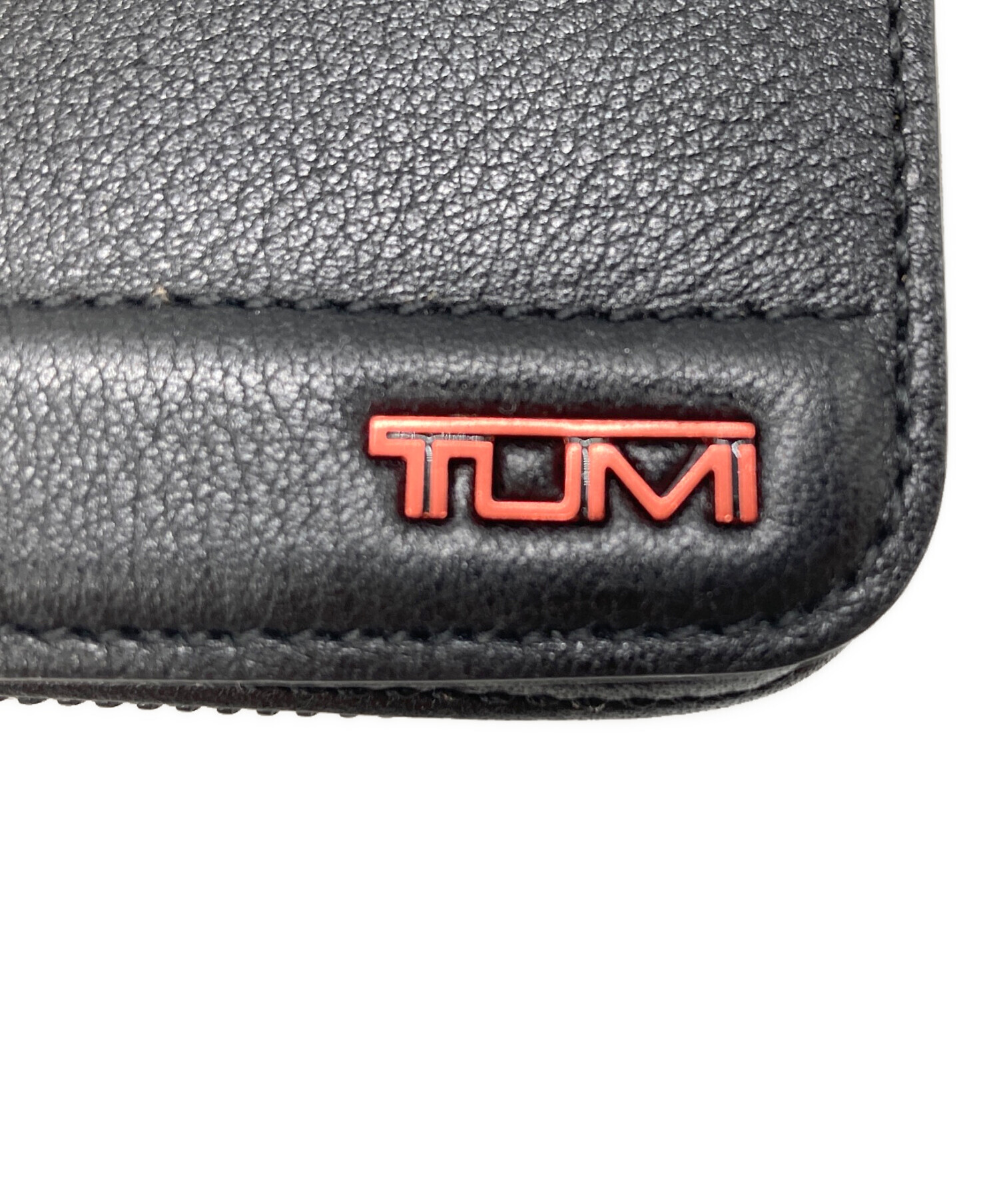 【未使用】TUMIの長財布 中古・古着通販】TUMI (トゥミ) 長財布 ブラック×レッド｜ブランド