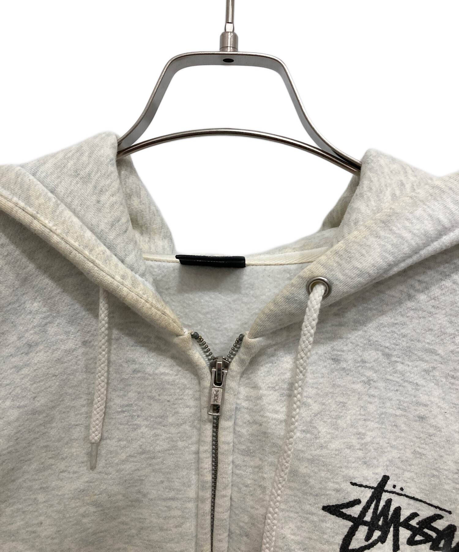 Stüssy グレー フード付きパーカー L 古着 Stüssy グレー フード付きパーカー L 古着