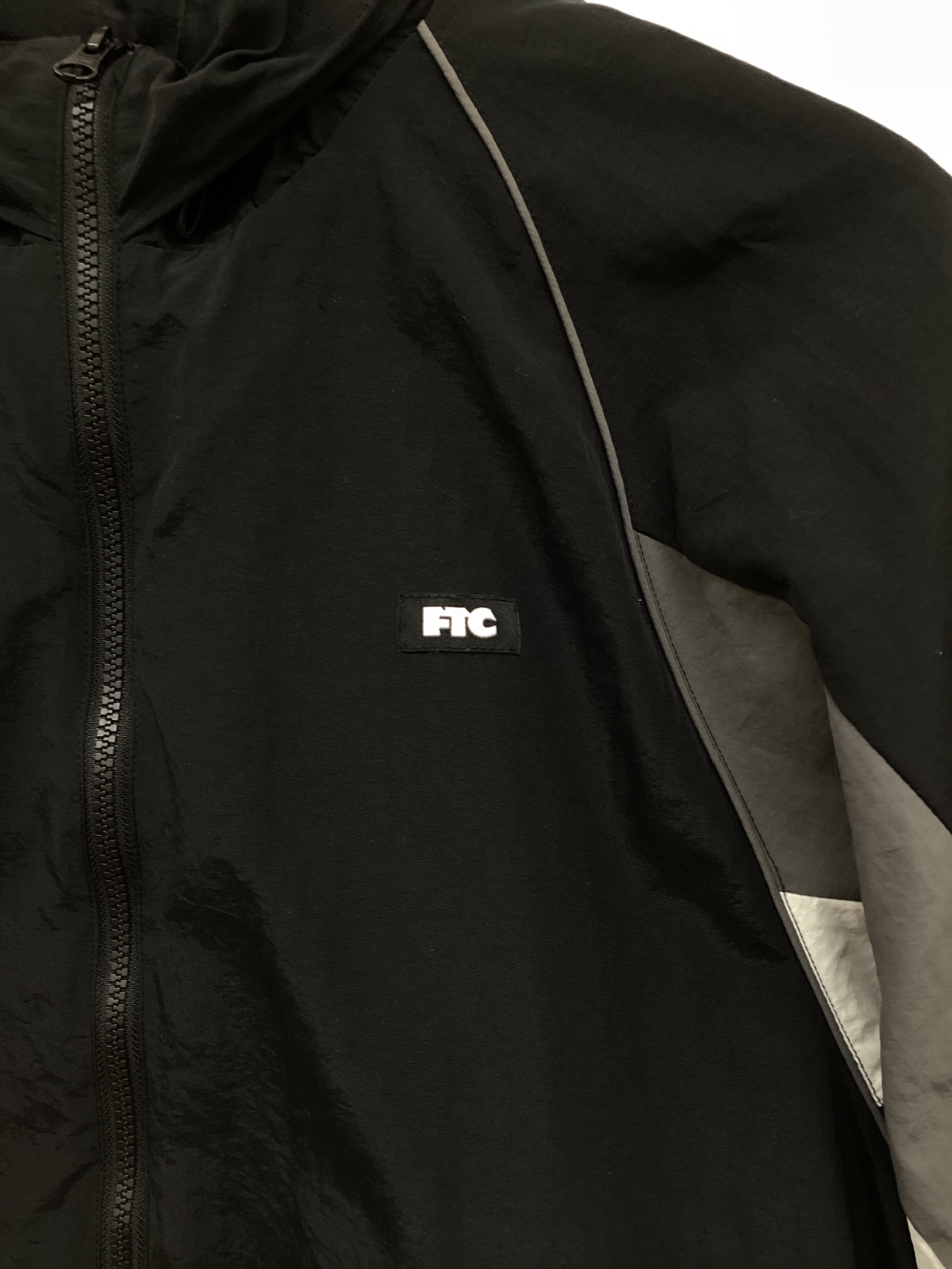 中古・古着通販】FTC (エフティーシー) NYLON TRACK JACKET ブラック