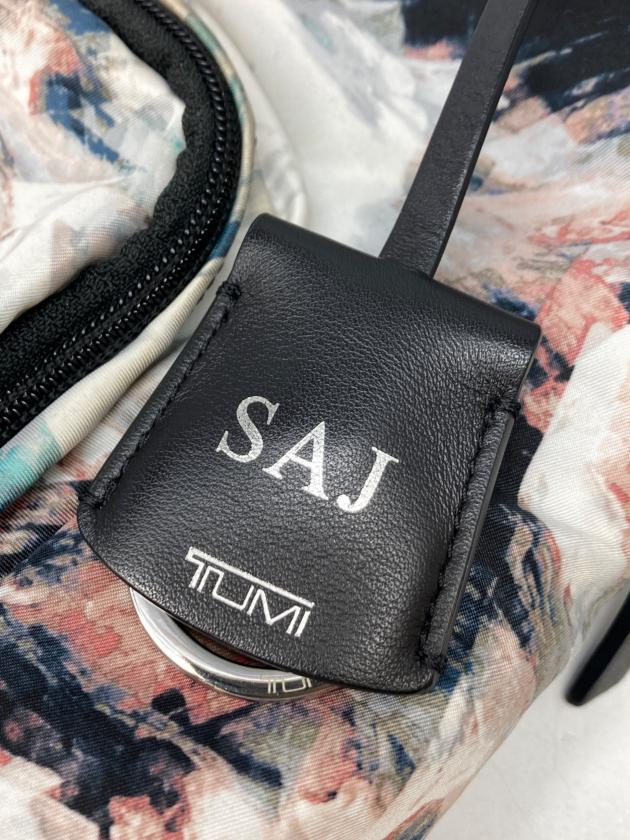 中古・古着通販】TUMI (トゥミ) 総柄ナイロンリュック マルチカラー