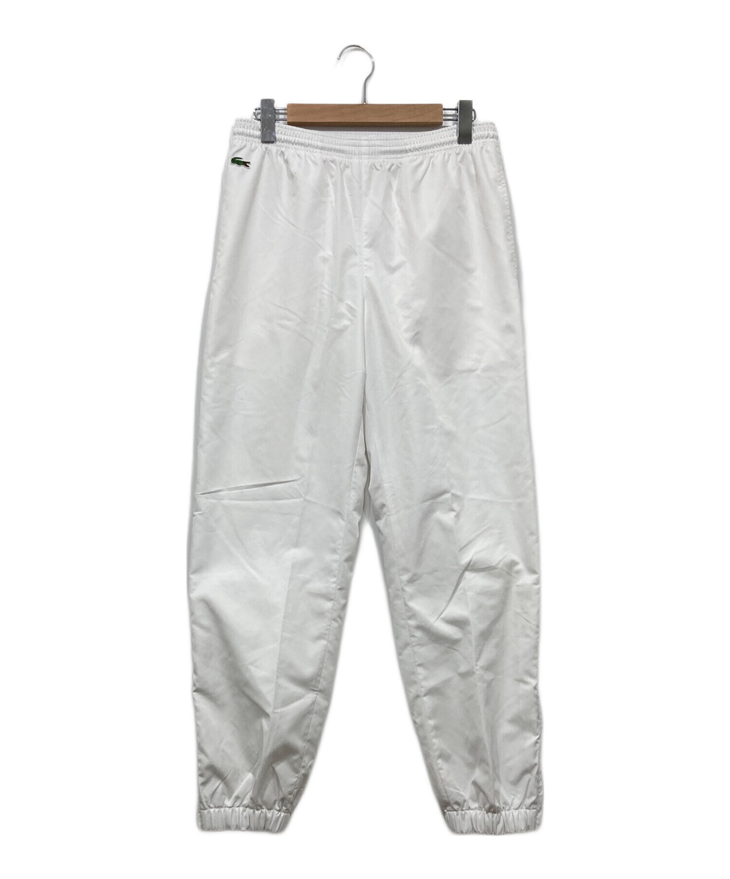 Lacoste パンツ 中古・古着通販】LACOSTE (ラコステ) ナイロンパンツ ホワイト サイズ
