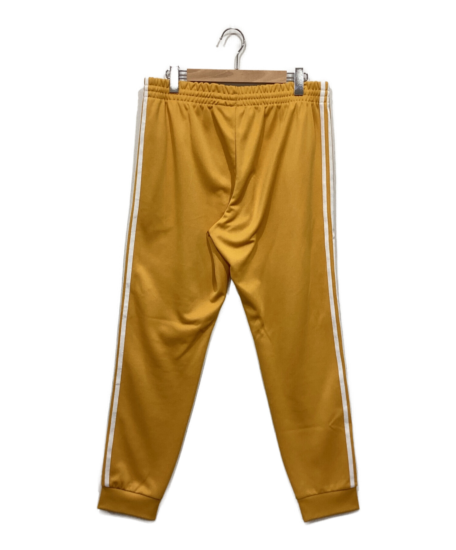 中古・古着通販】adidas (アディダス) トラックパンツ イエロー サイズ