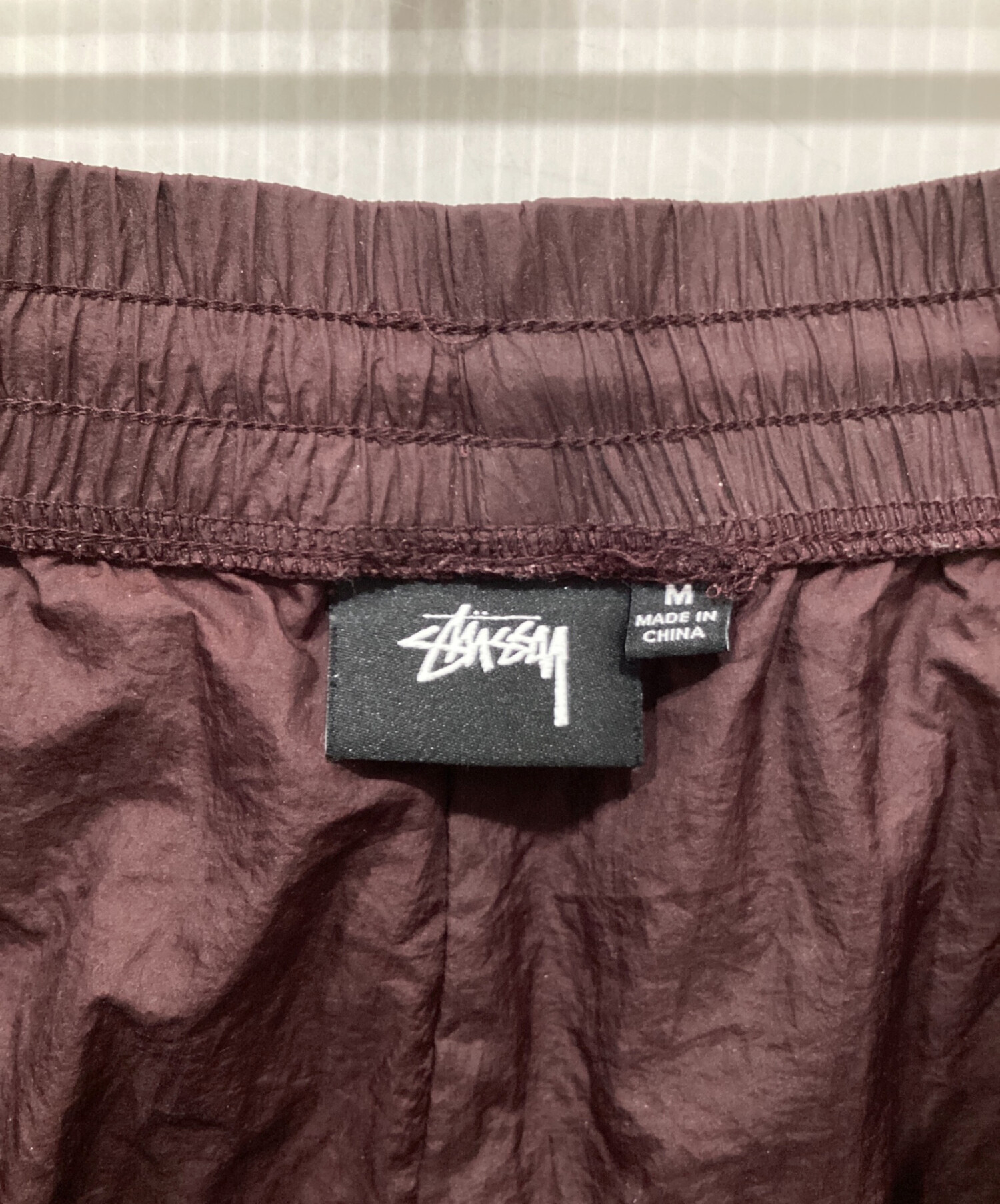中古・古着通販】stussy (ステューシー) ナイロンパンツ ブラウン