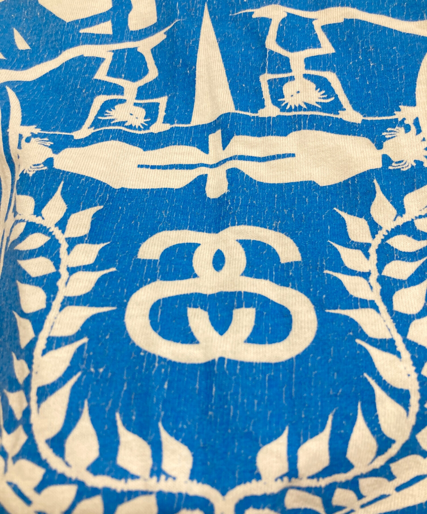 ステューシー　総柄　シャドーマン　ロゴ　刺繍　ハーフ 中古・古着通販】stussy (ステューシー) シャドーマンサックスロゴ
