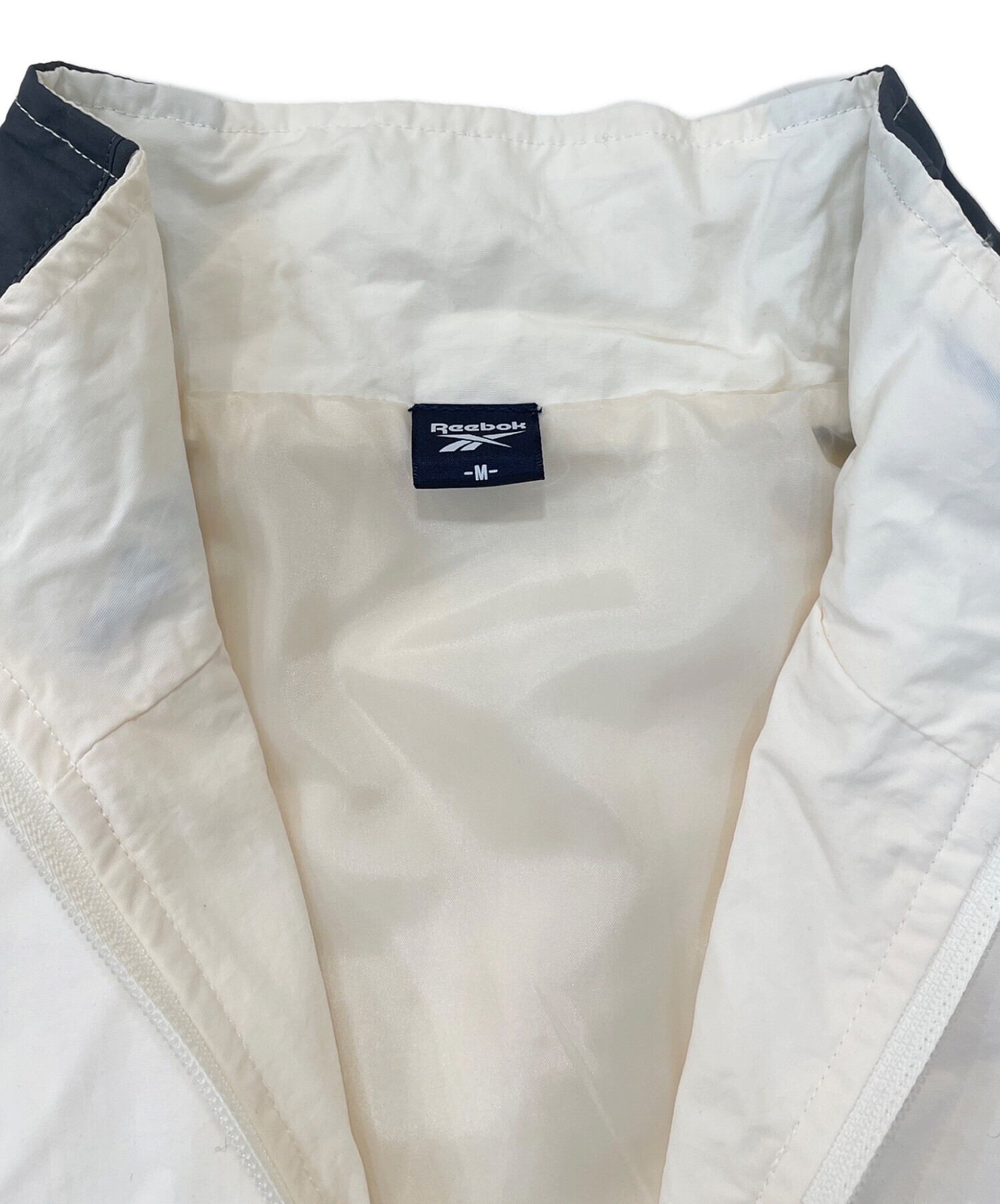 中古・古着通販】REEBOK (リーボック) 別注スモールベクター刺繍裾 