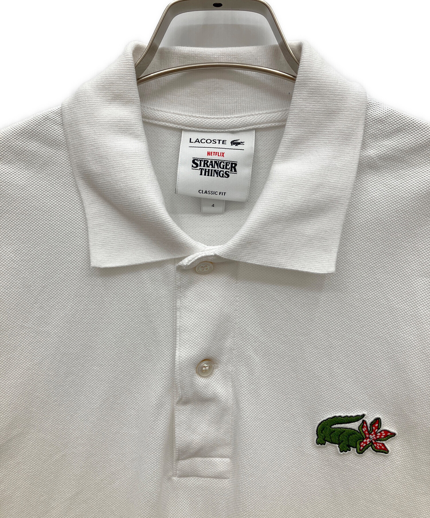 LACOSTE x Stranger Things ポロシャツ 白 中古・古着通販】LACOSTE (ラコステ) STRANGER THINGS (ストレンジャー