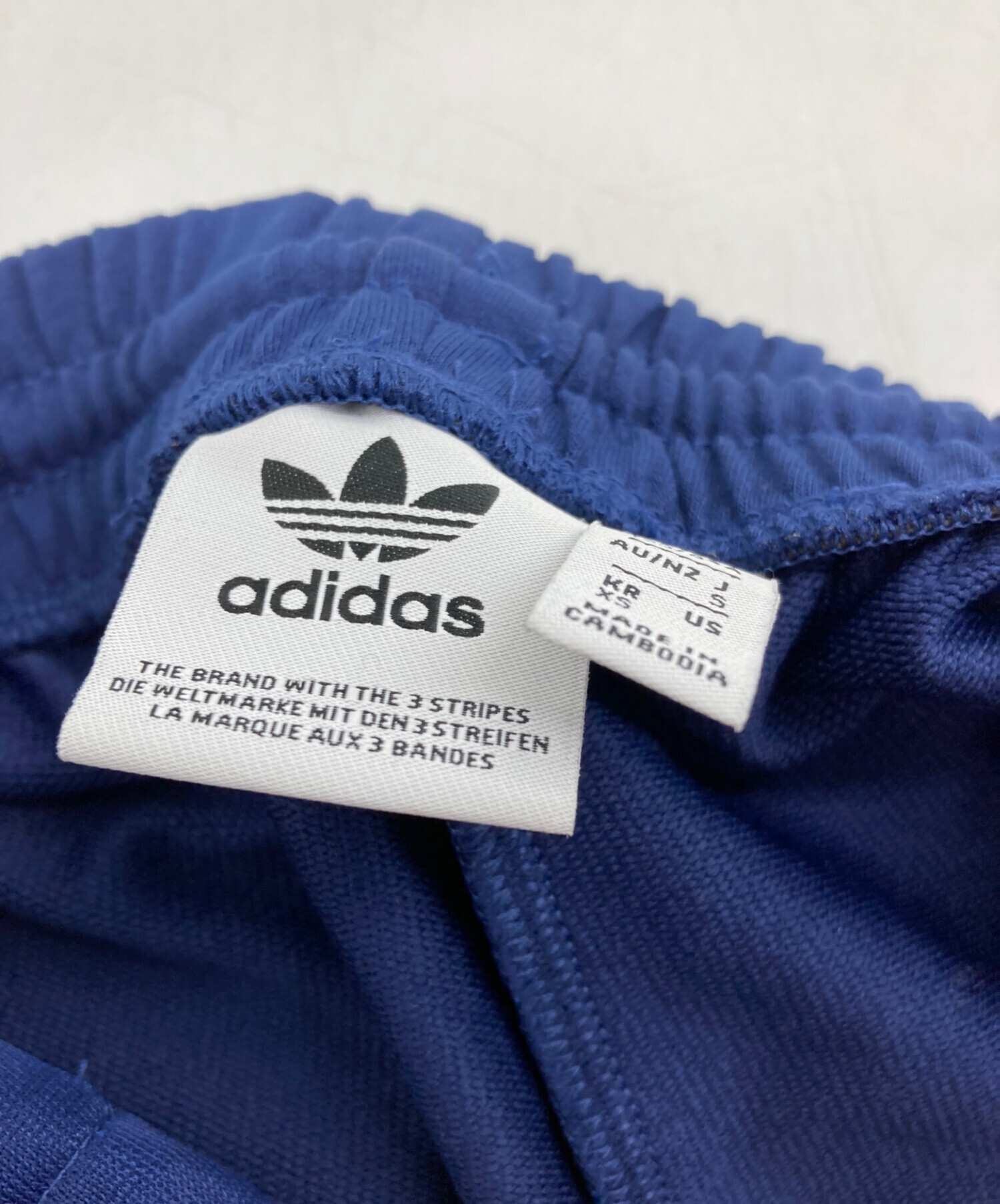 中古・古着通販】adidas (アディダス) ルーズトラックパンツ ネイビー