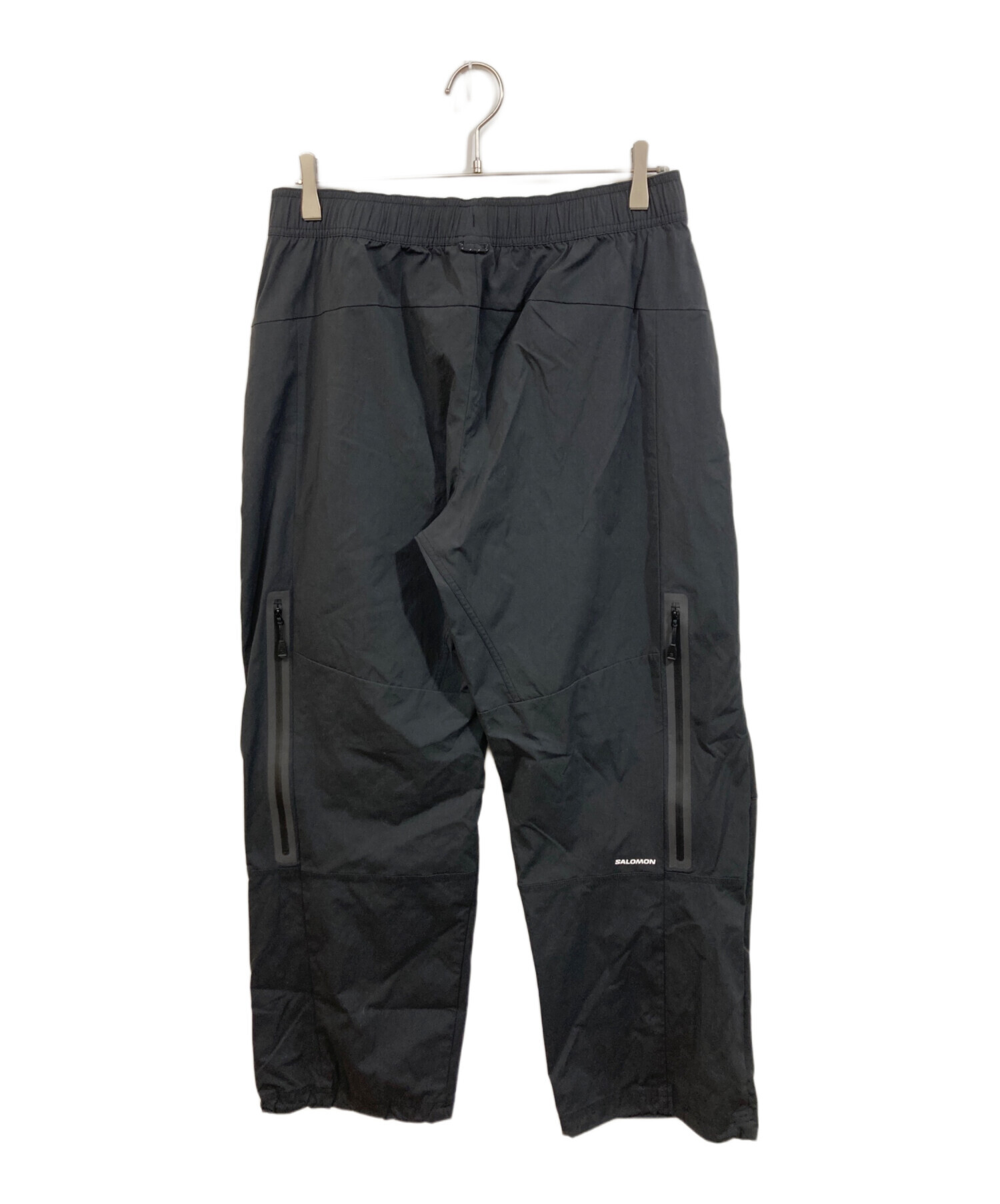 SALOMON ナイロンパンツ Lサイズ 新品未使用 中古・古着通販】SALOMON (サロモン) ナイロンイージーパンツ ブラック