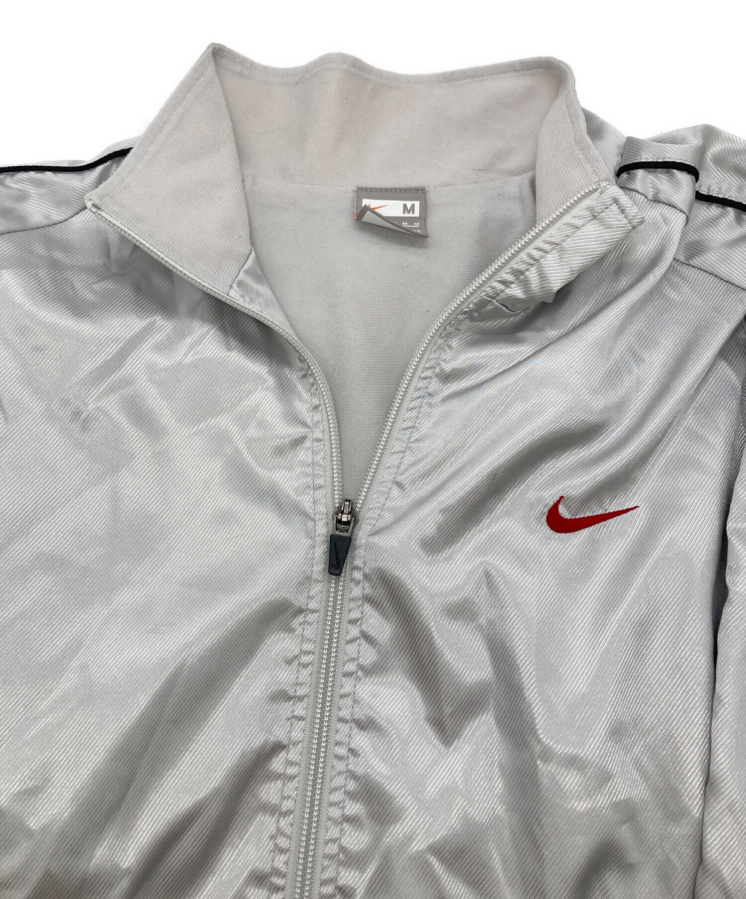 【完売品】NIKE ジャケット 中古・古着通販】NIKE (ナイキ) ジップアップジャケット シルバー