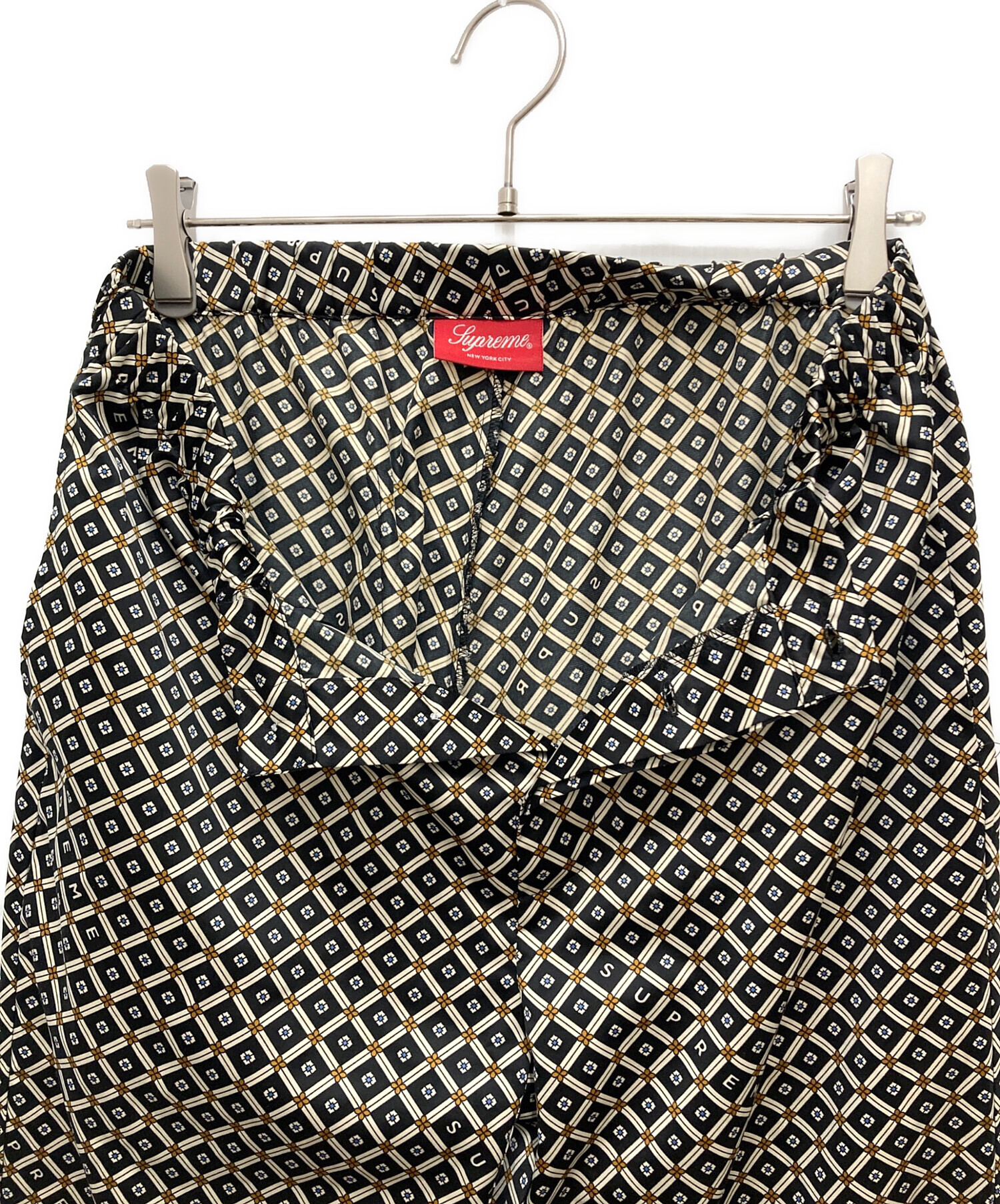 中古・古着通販】SUPREME (シュプリーム) 総柄サテンパンツ ブラック