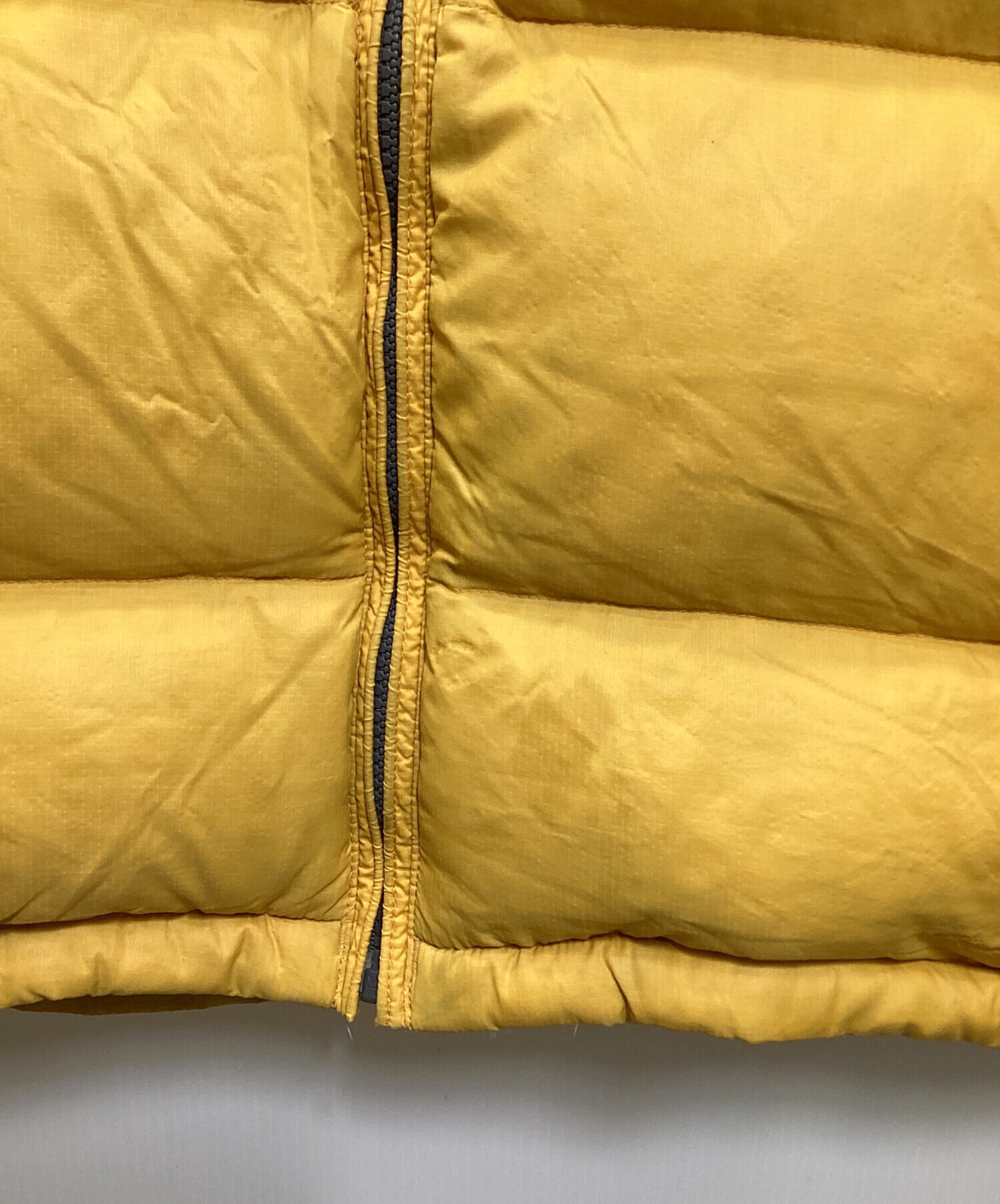中古・古着通販】MARMOT (マーモット) ダウンベスト イエロー サイズ