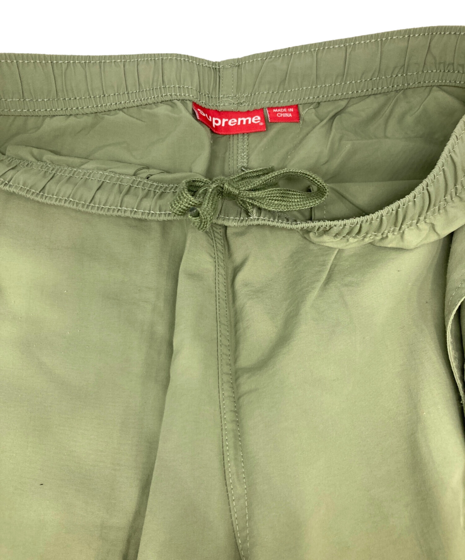 中古・古着通販】SUPREME (シュプリーム) ウォームアップパンツ カーキ