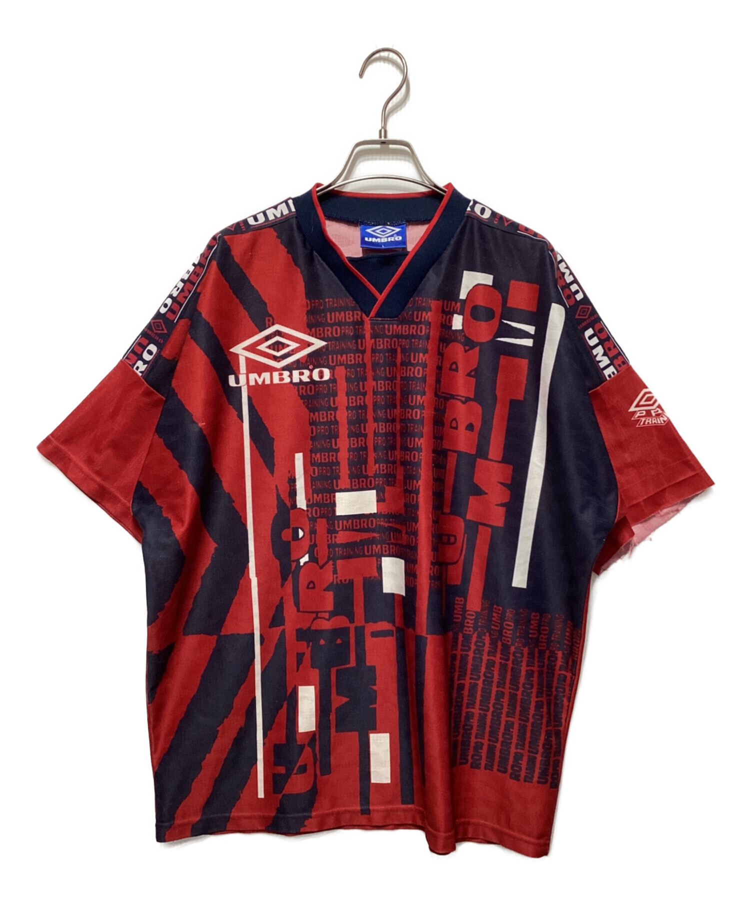 【90s当時物】UMBRO アンブロ PRO TRAINING ゲームシャツ L 中古・古着通販】UMBRO (アンブロ) 90's ゲームシャツ ネイビー×レッド